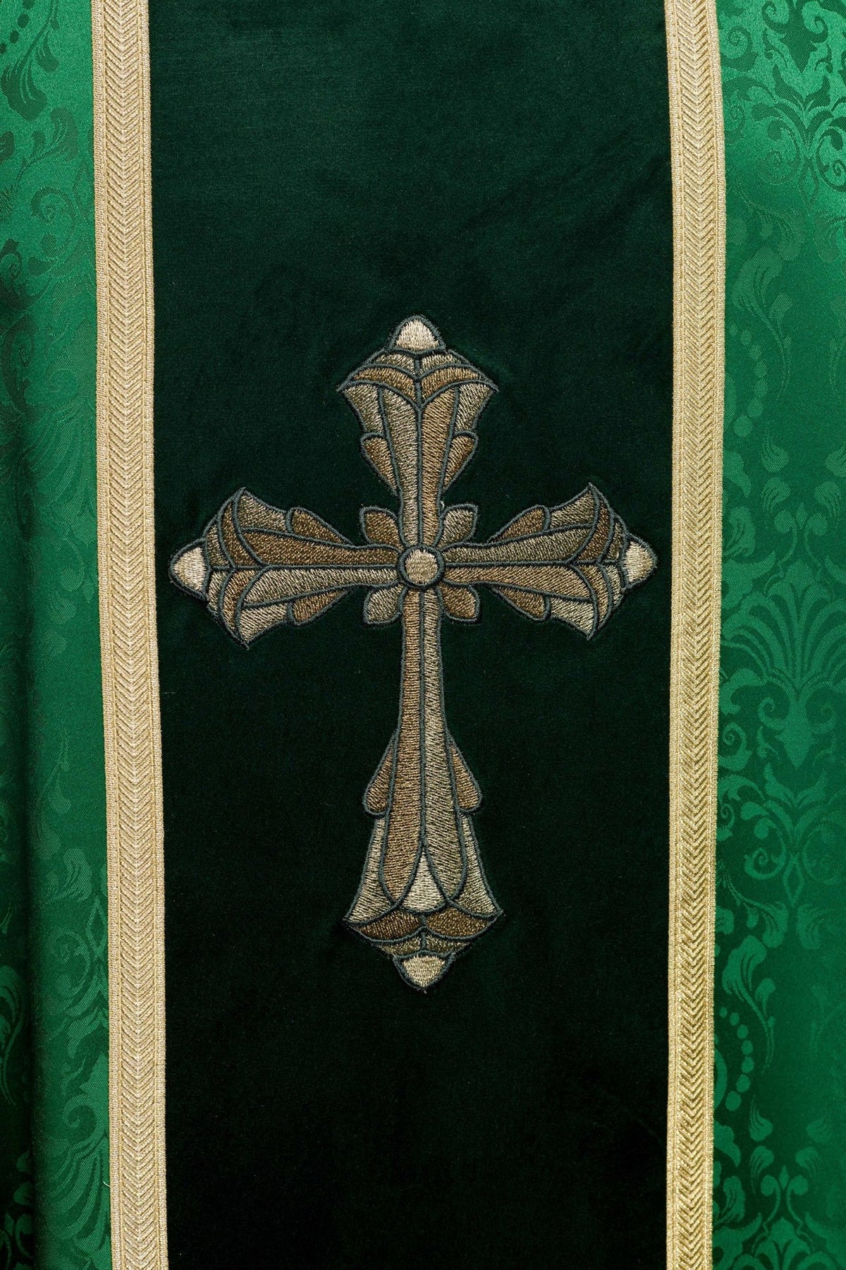 Green chasuble back detail with cross embroidery and gold trim