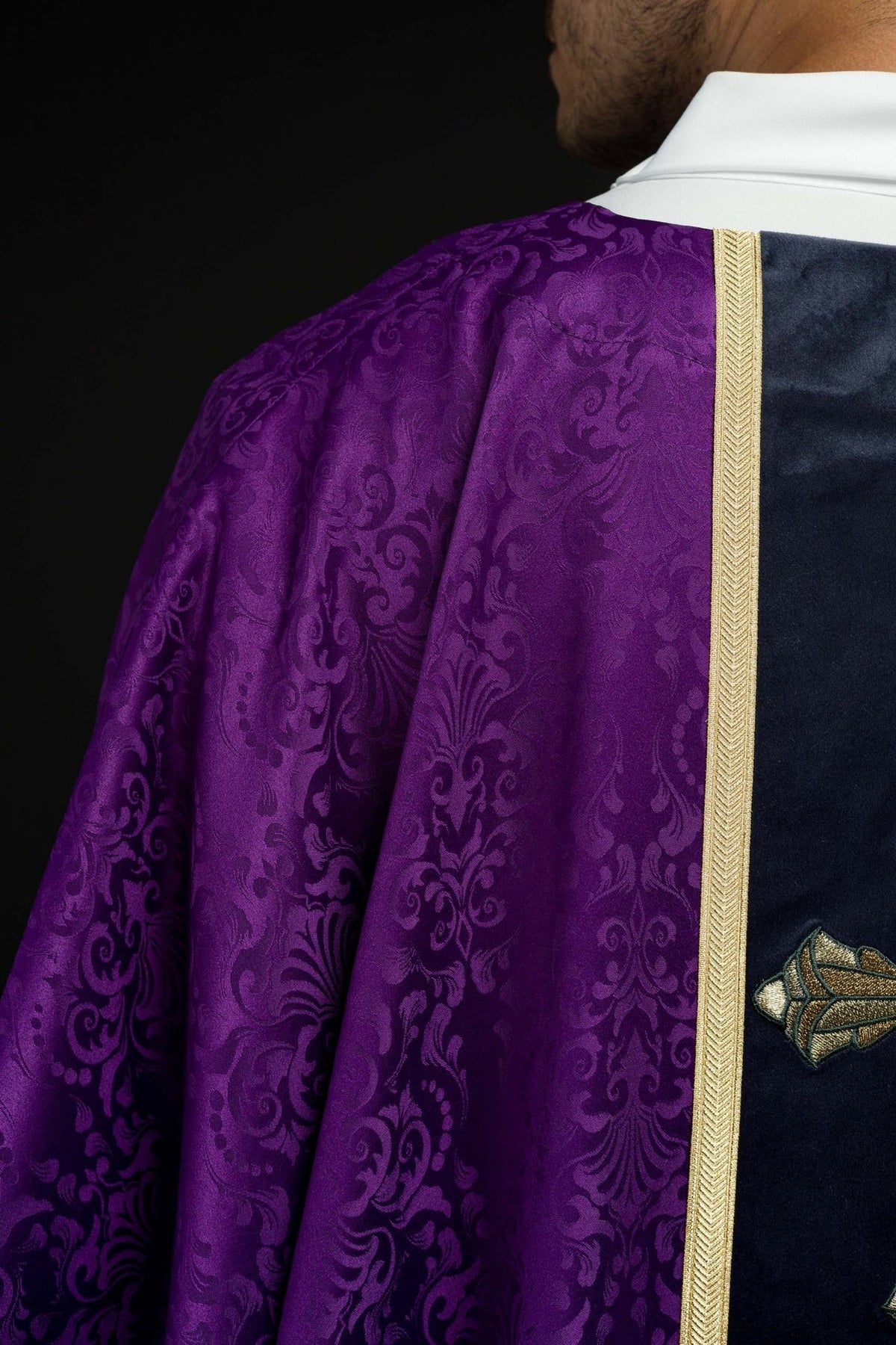 Purple chasuble, back close-up with dark orphrey and gold trim