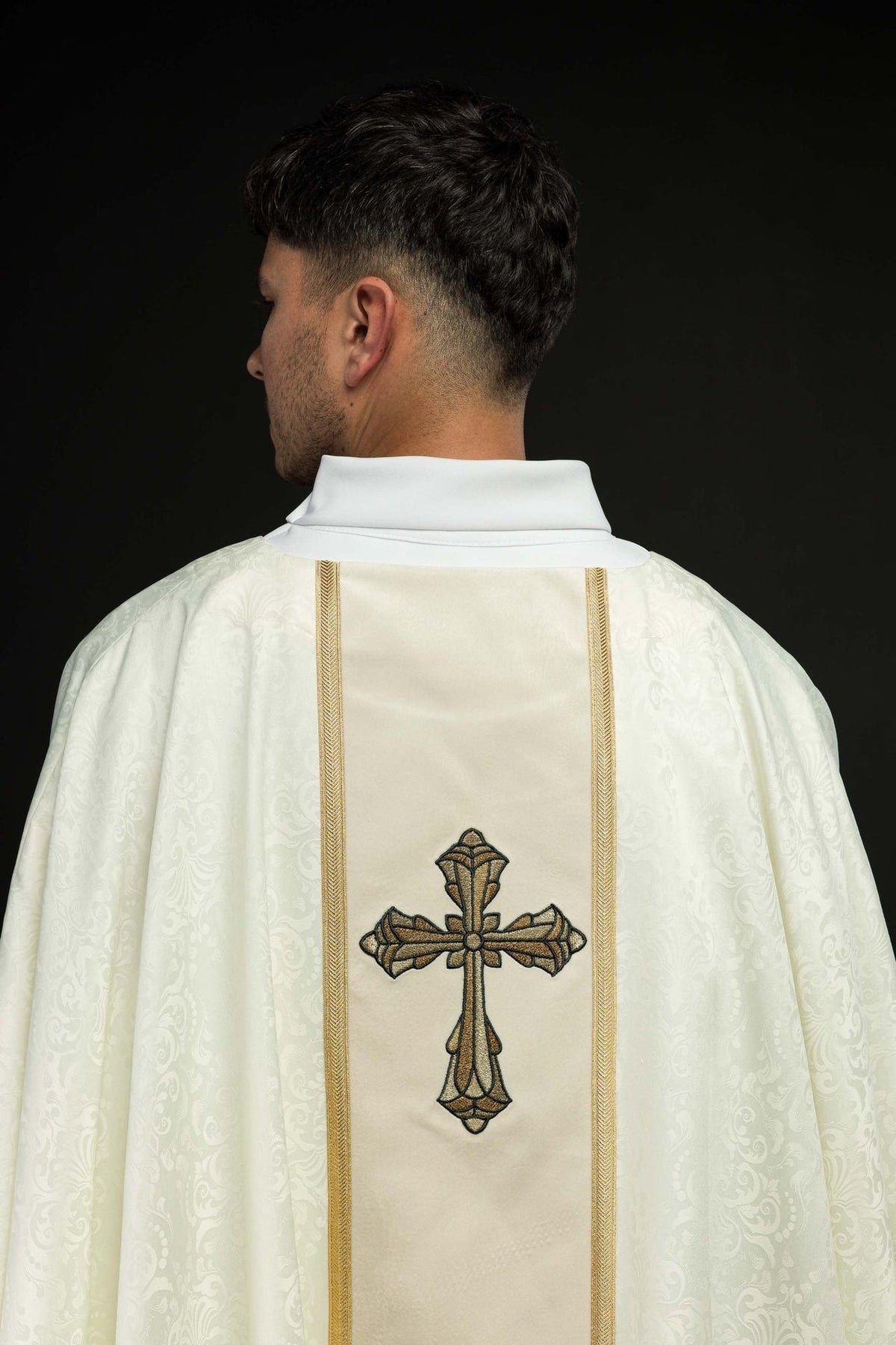 Ecru chasuble back view with cross embroidery and gold orphrey
