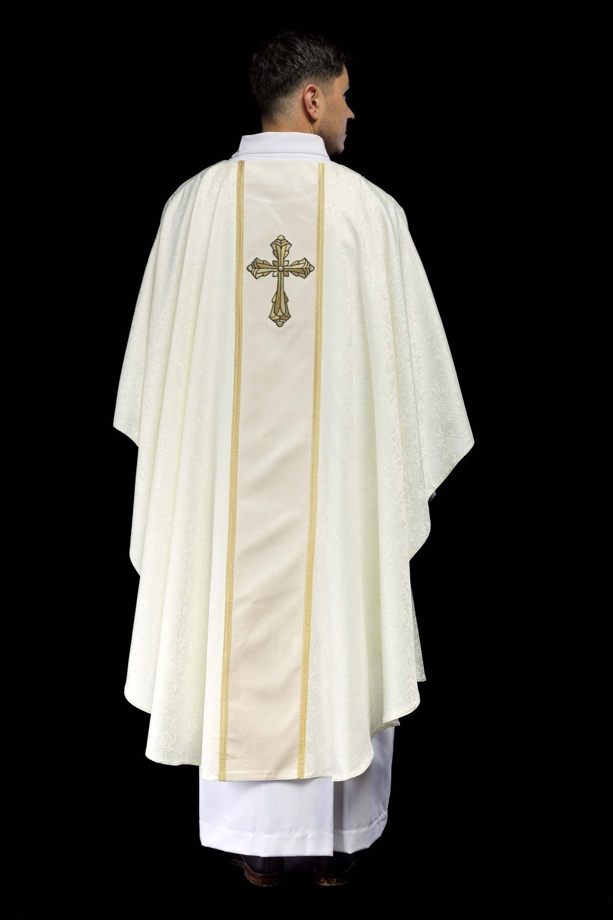 Ecru chasuble back view with full-length orphrey and cross embroidery