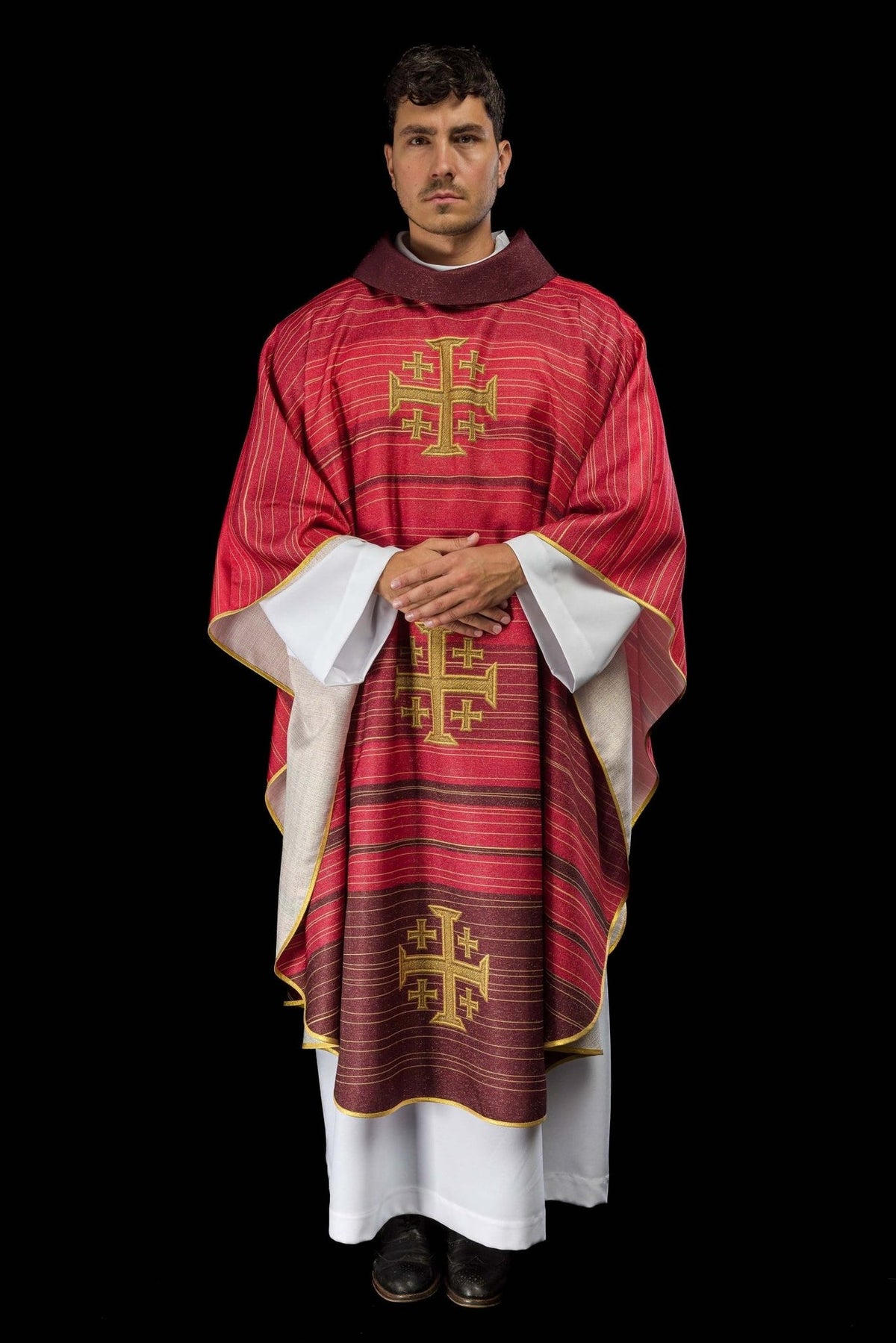 Red chasuble back view with three gold Jerusalem crosses and gold trim