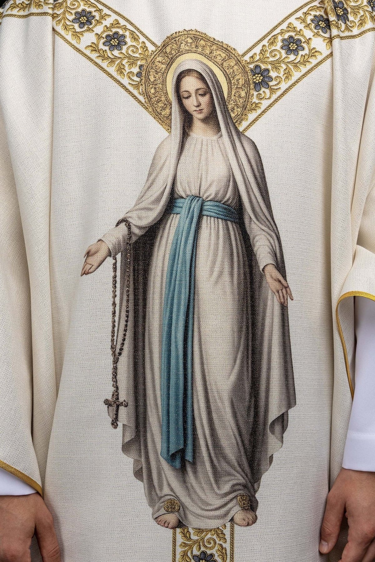 Marian chasuble close-up showing Our Lady of Lourdes in light blue and cream