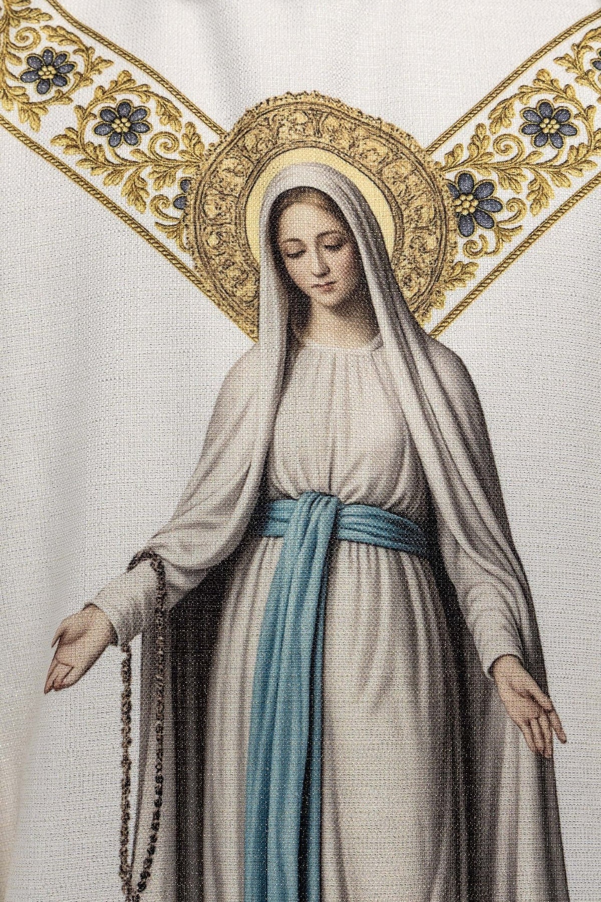 Marian chasuble detail showing Our Lady's face and gold halo
