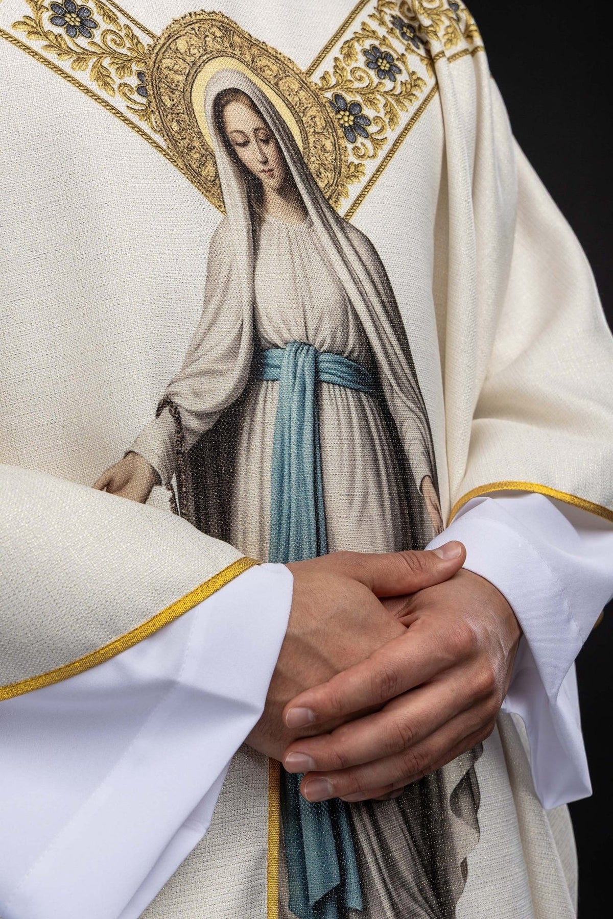 Marian chasuble worn close-up with cream fabric, Our Lady print and gold trim