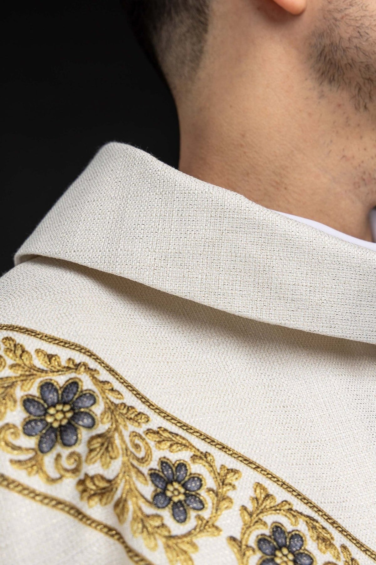 Marian chasuble close-up of light blue Our Lady print and gold trim