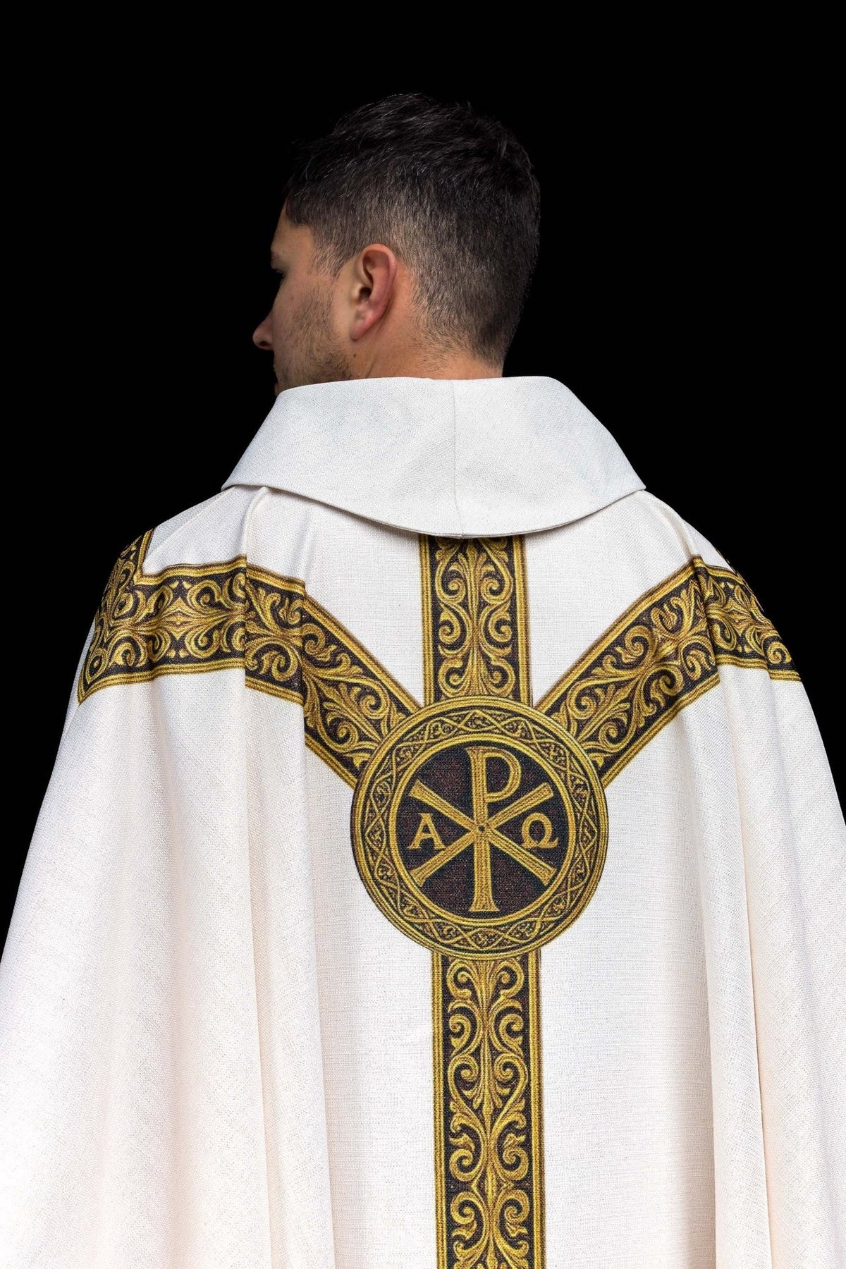 Ecru Catholic chasuble back view with printed Pax cross and gold orphrey