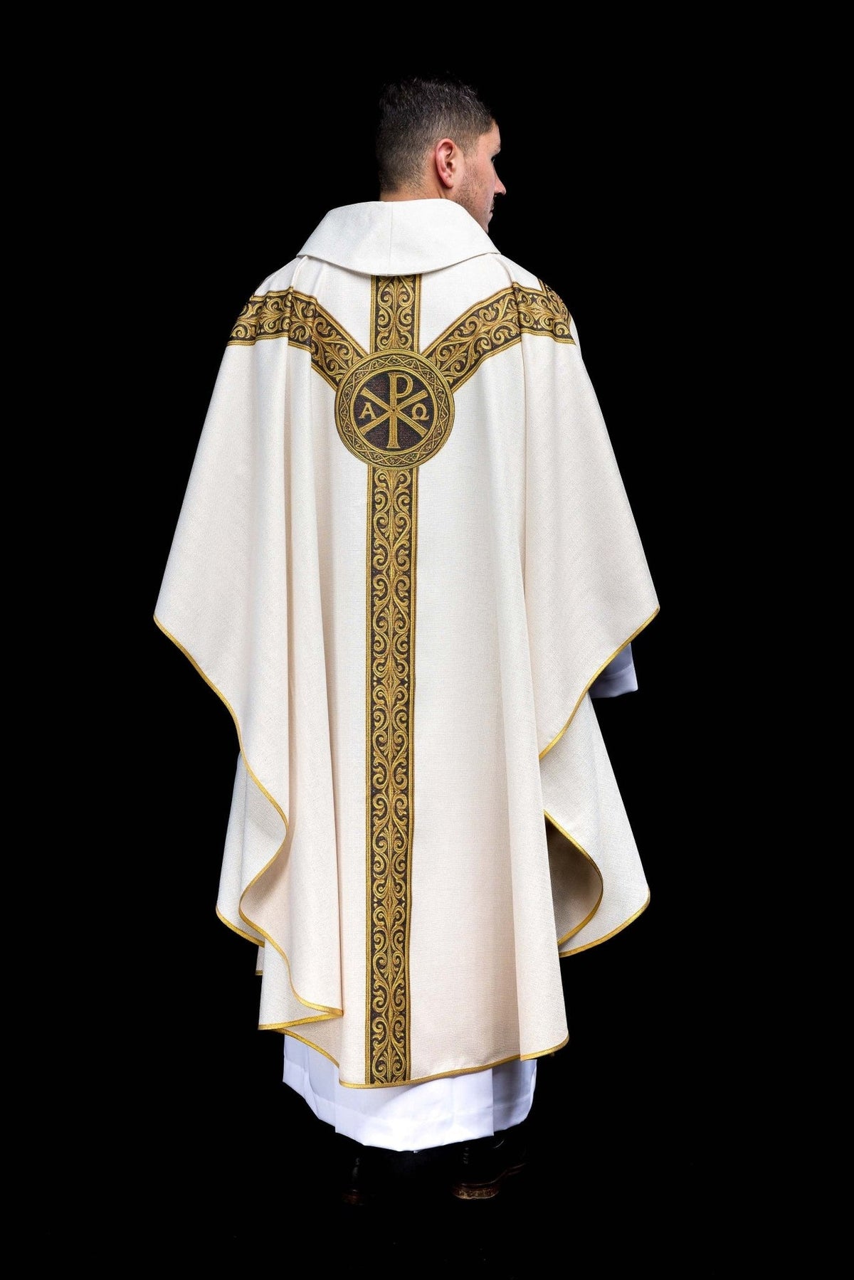 Ecru Catholic chasuble rear view with gold-edged panels and Pax cross
