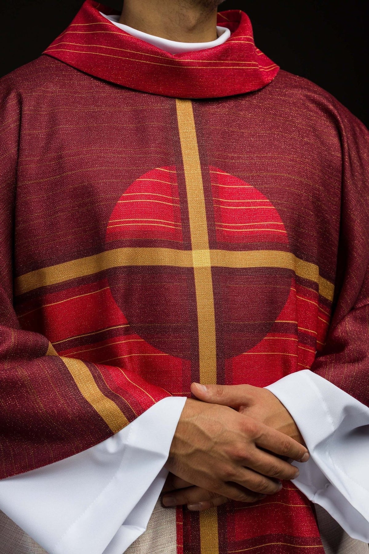 Red chasuble cross motif front close-up
