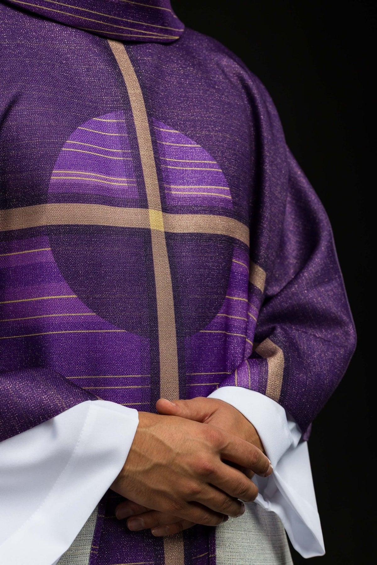 Purple cross chasuble, close-up front view showing printed cross motif and gold lines