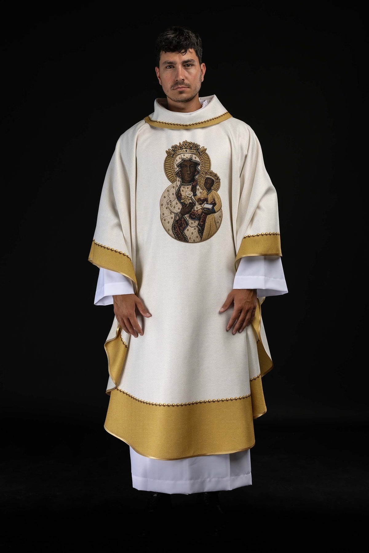 White and gold printed chasuble worn from the front with Our Lady and Child image