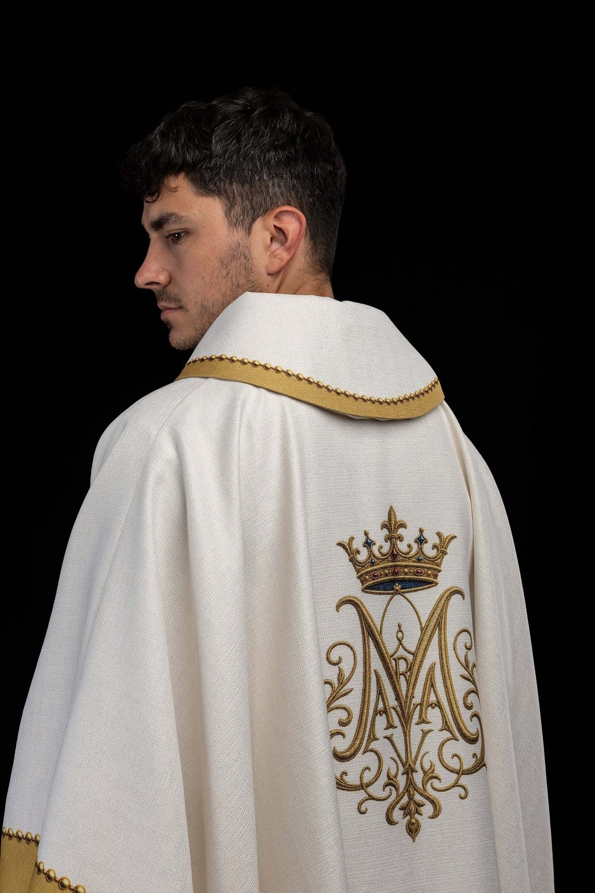 Printed chasuble close-up showing gold sleeve trim and beaded edging