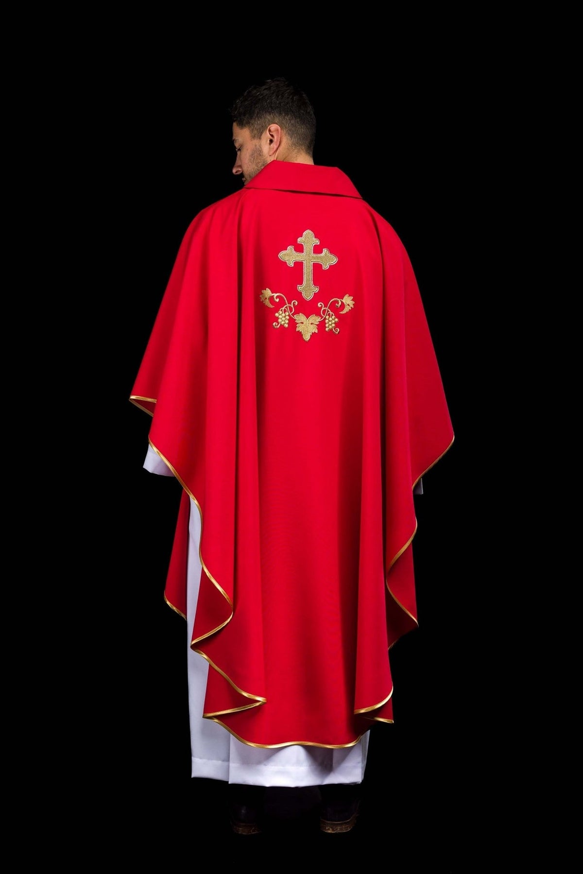 Red chasuble back view showing wide collar, gold embroidery and trim