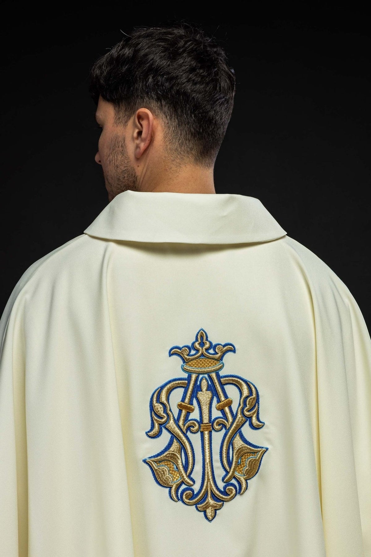 Chasuble back view with embroidered Marian symbol and wide collar