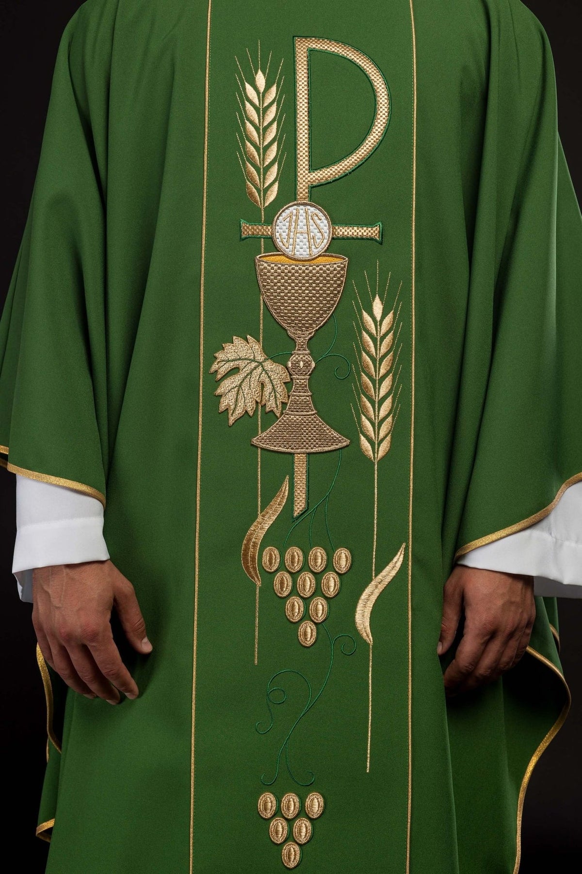 Green chasuble close-up of embroidered IHS chalice, wheat and grape motifs