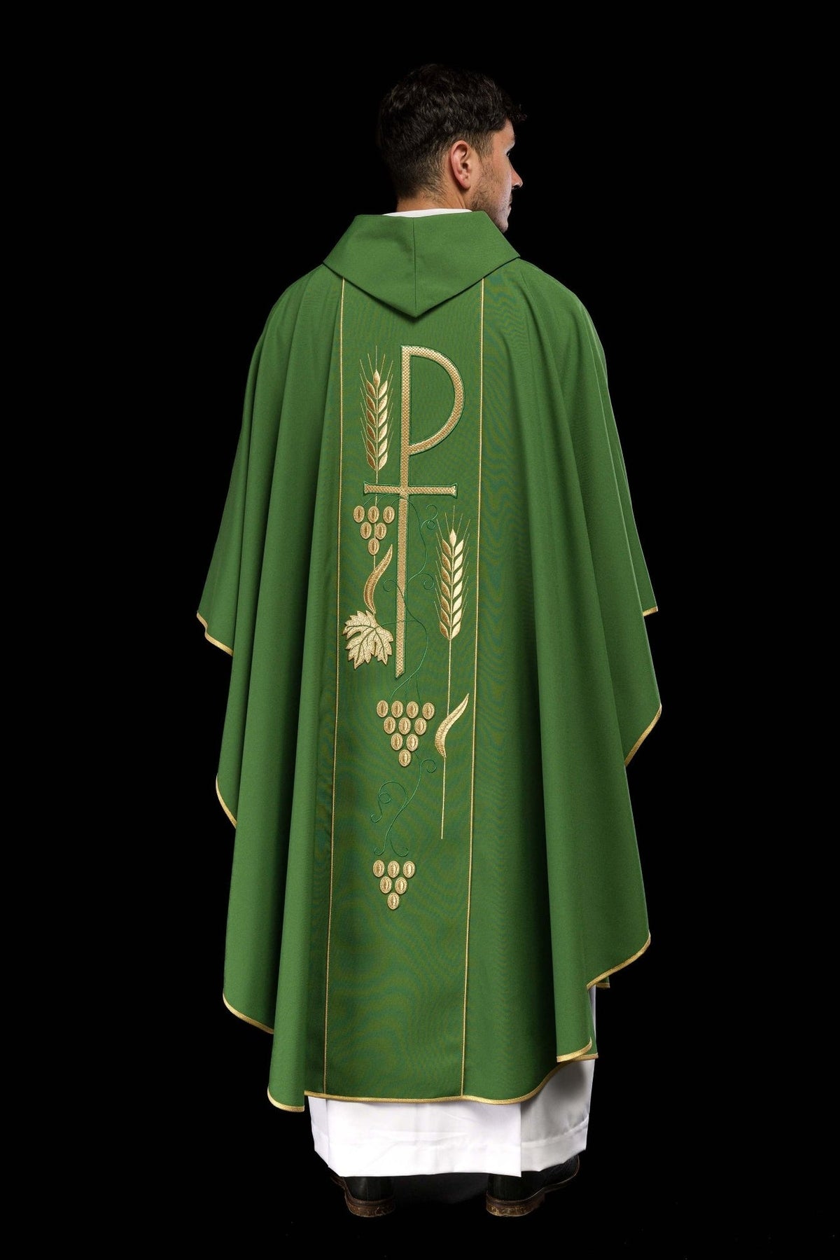 Green chasuble back close-up with embroidered cross and grape motifs