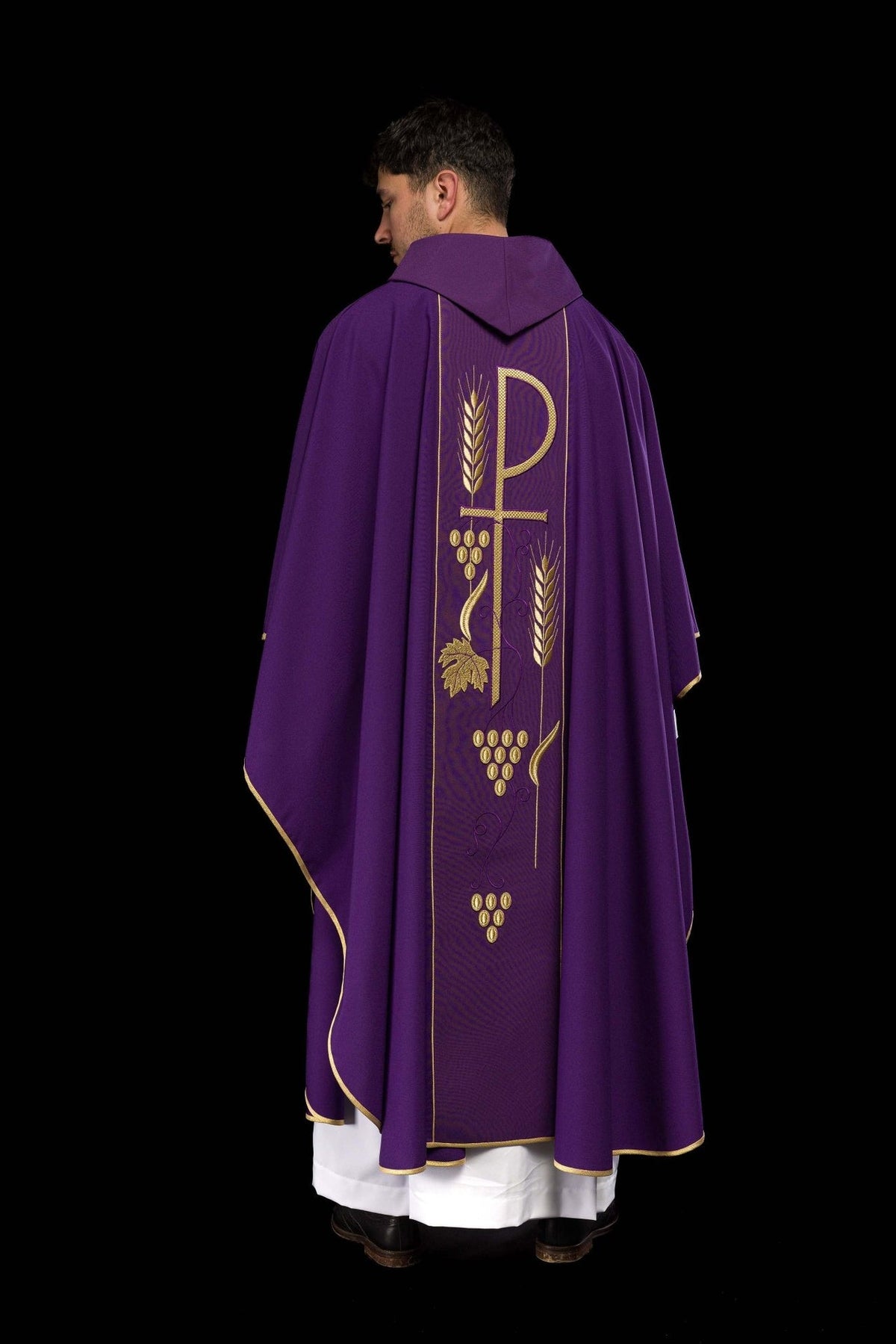 Purple chasuble back detail showing gold cross, wheat and grape embroidery