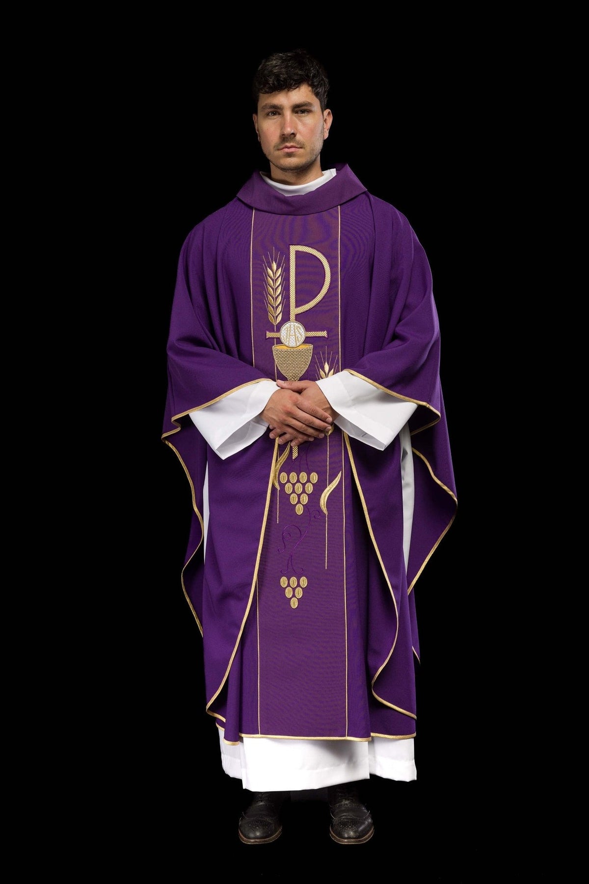 Purple embroidered chasuble worn front view with gold trim and central orphrey