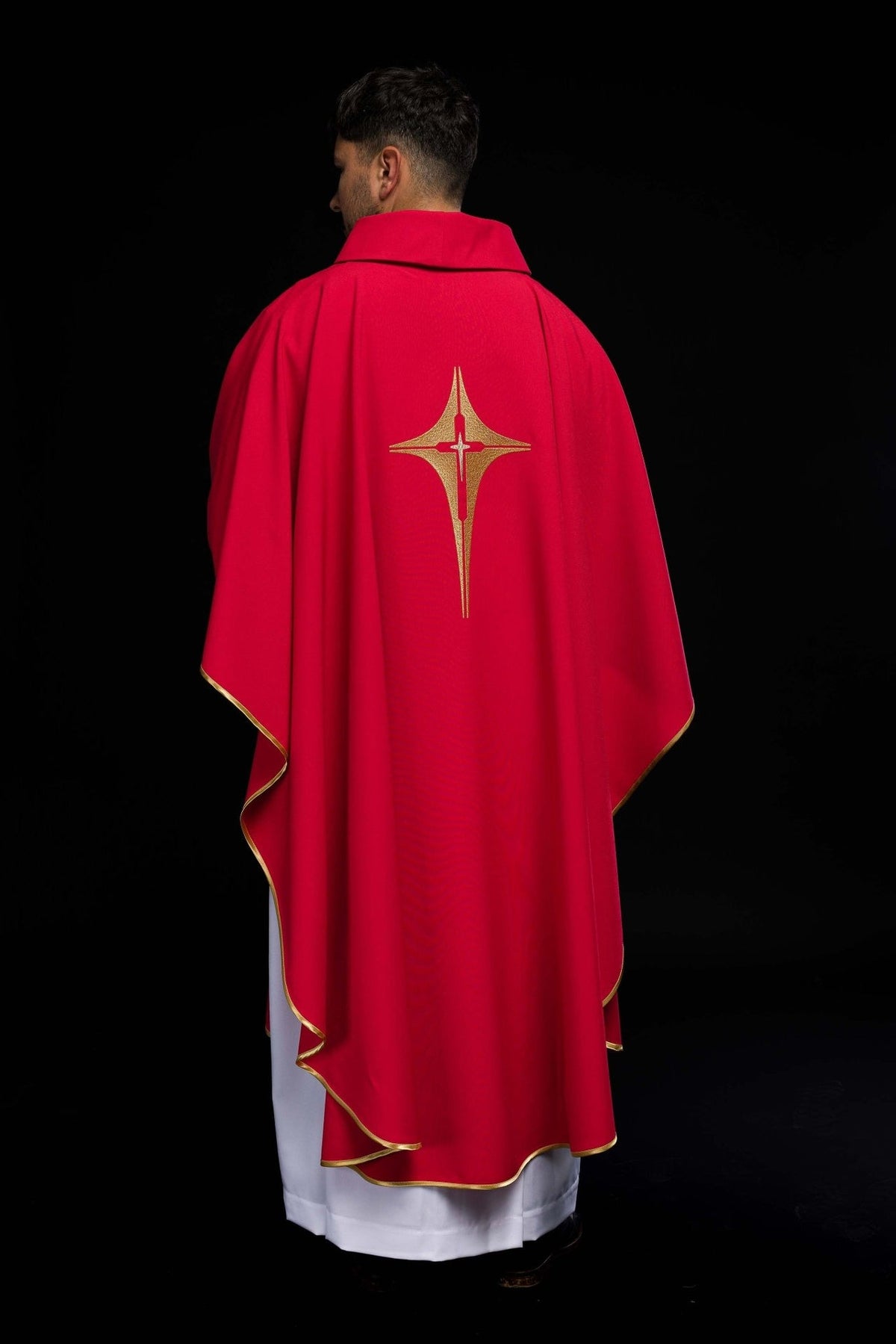 Red chasuble back view showing gold trim and cross embroidery