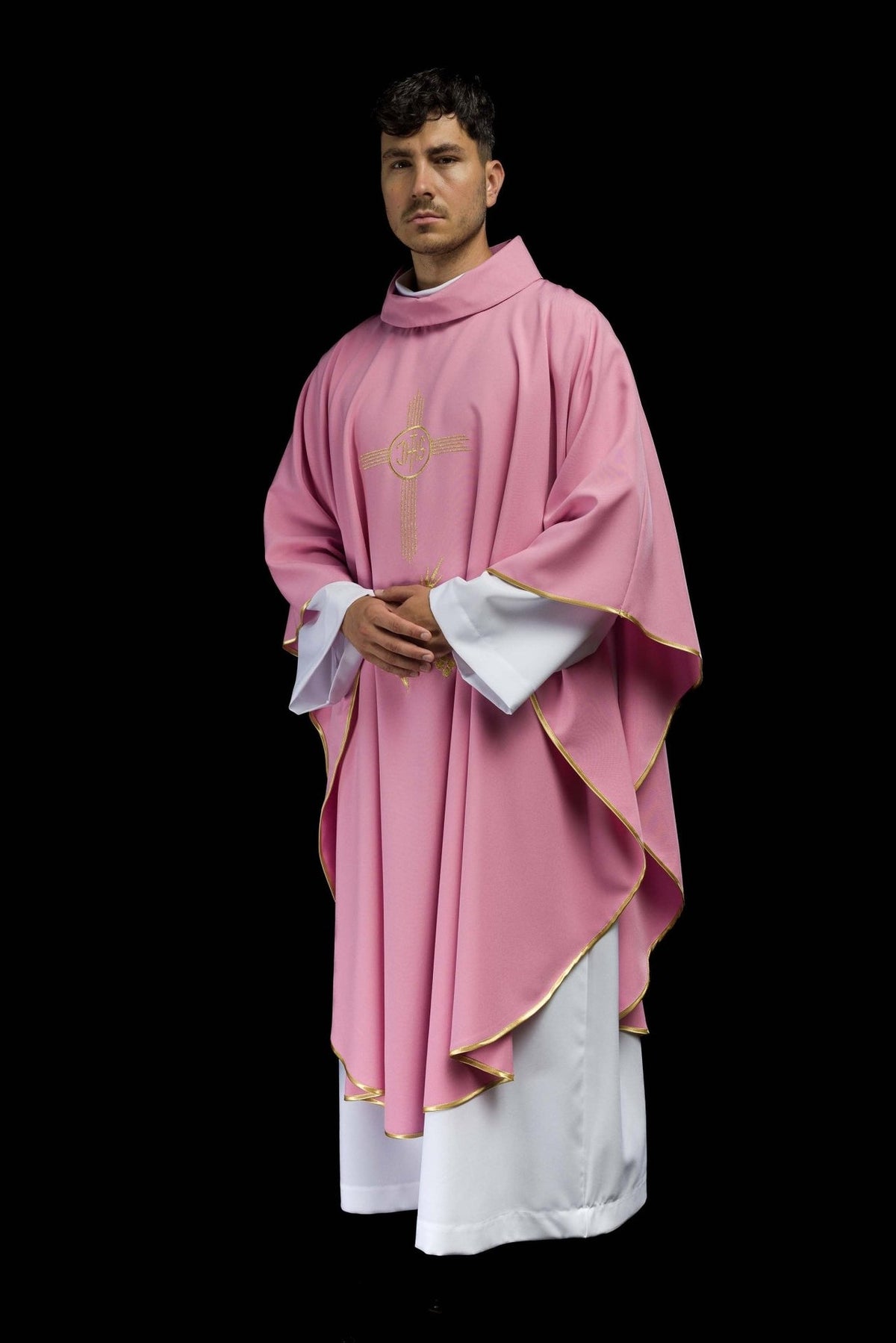 Rose chasuble three-quarter front view with gold IHS embroidery and trim