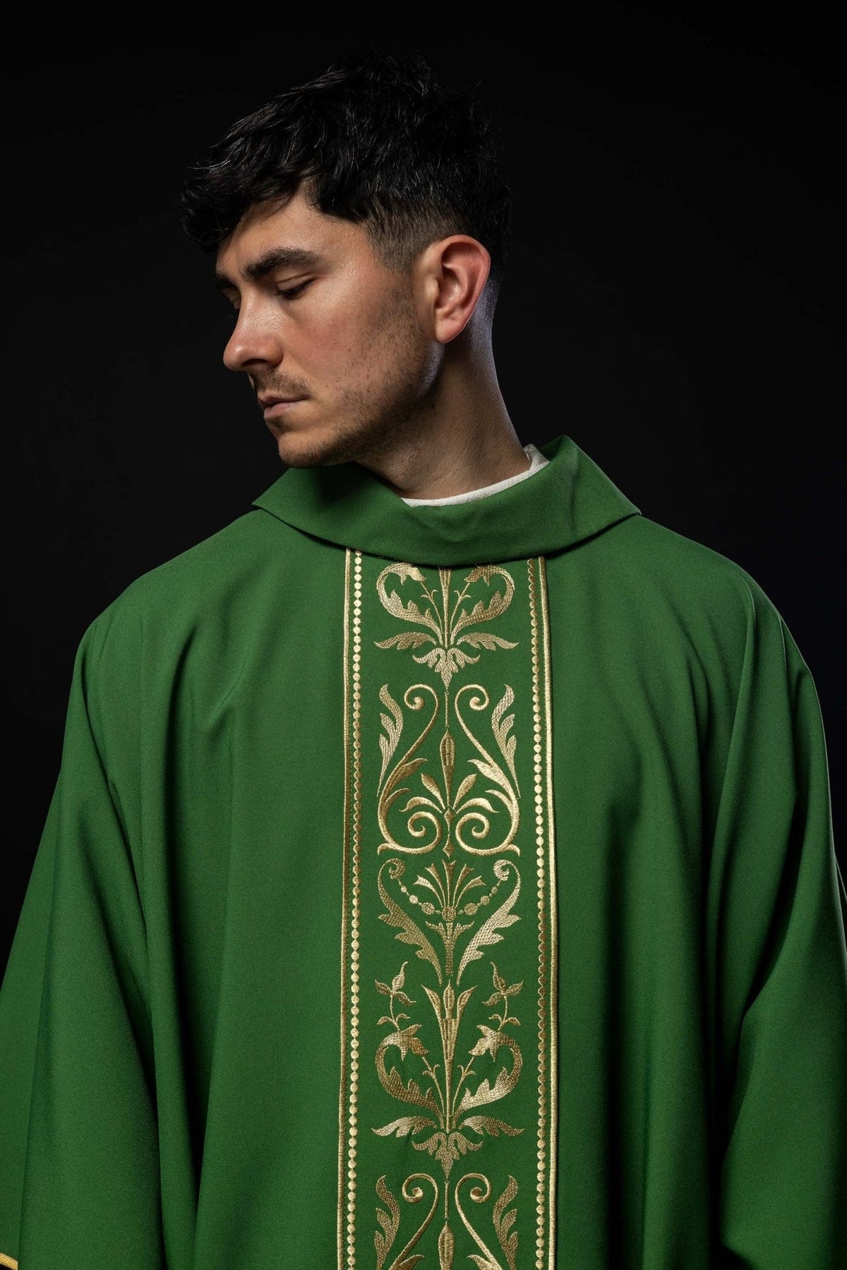 Green chasuble upper front view with gold embroidered floral orphrey
