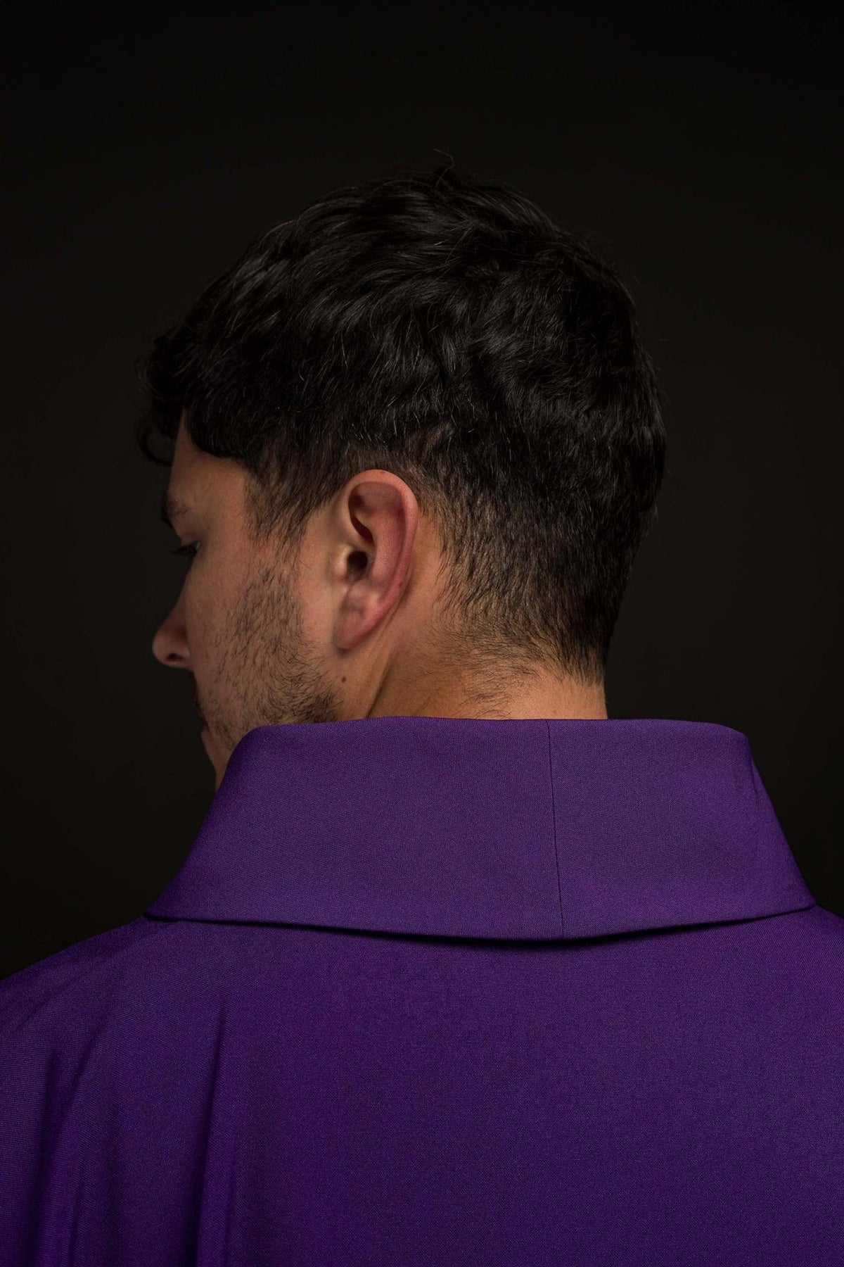 Purple chasuble back close-up showing stand-up collar