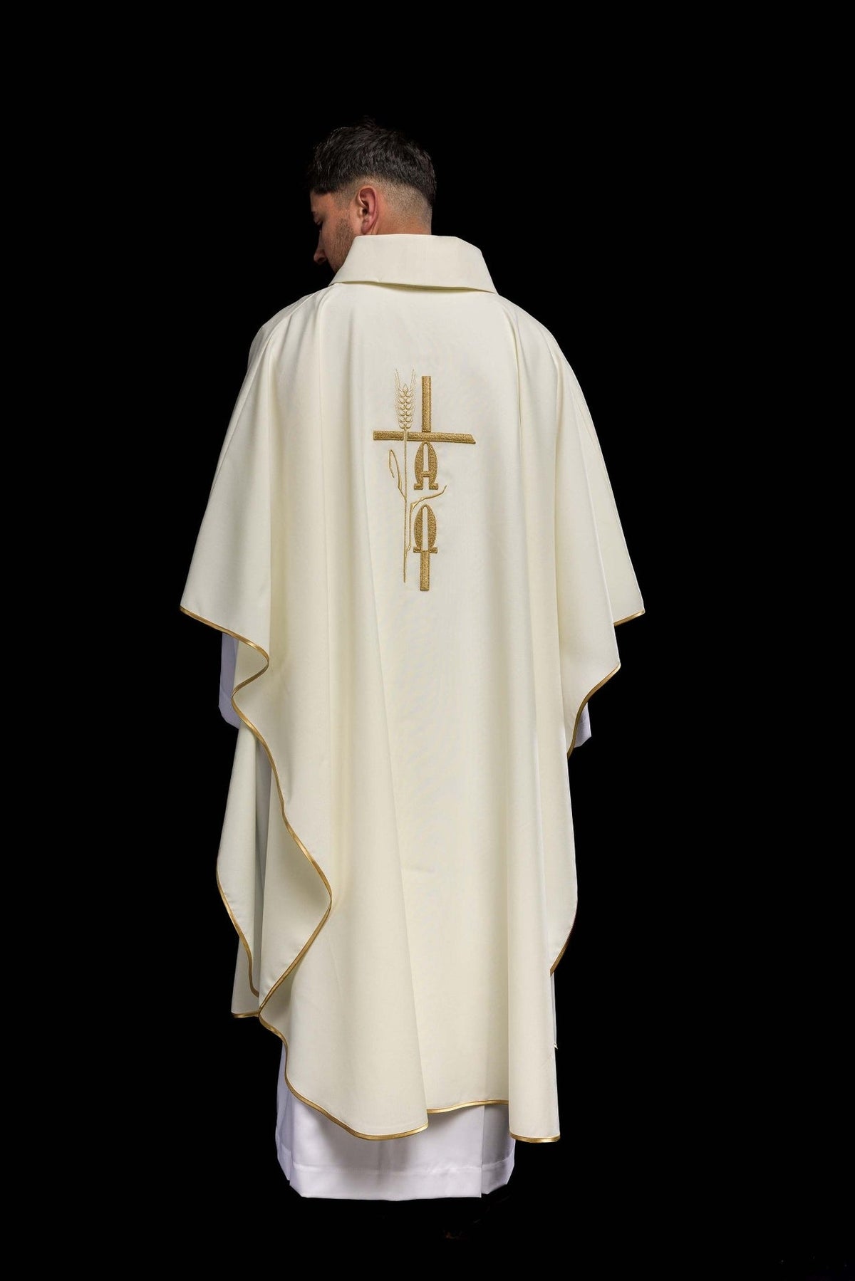 Ecru chasuble, back view with gold trim and central embroidery
