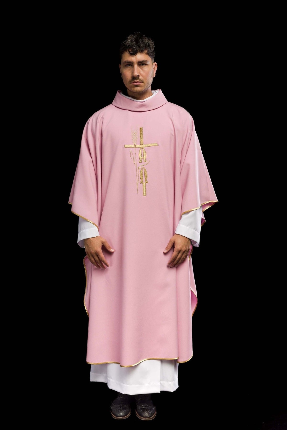 Pink chasuble front view with gold cross, IHS, rose motif and trim