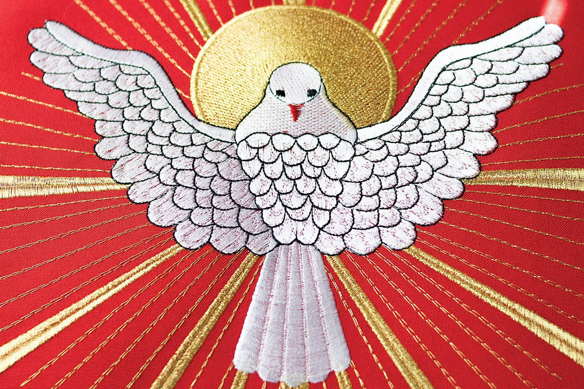Red chasuble close-up of gold trim and Holy Spirit embroidery