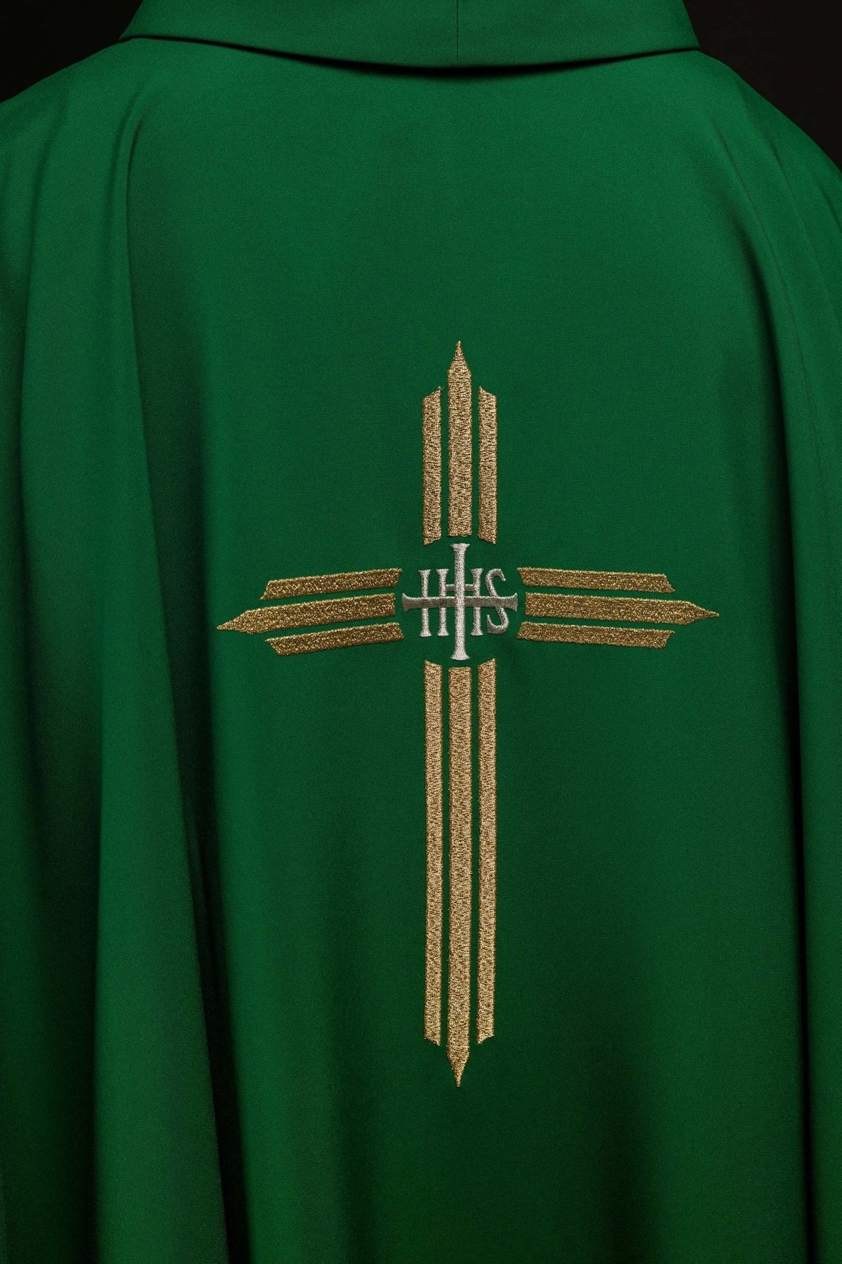 Green chasuble back view with gold IHS cross embroidery