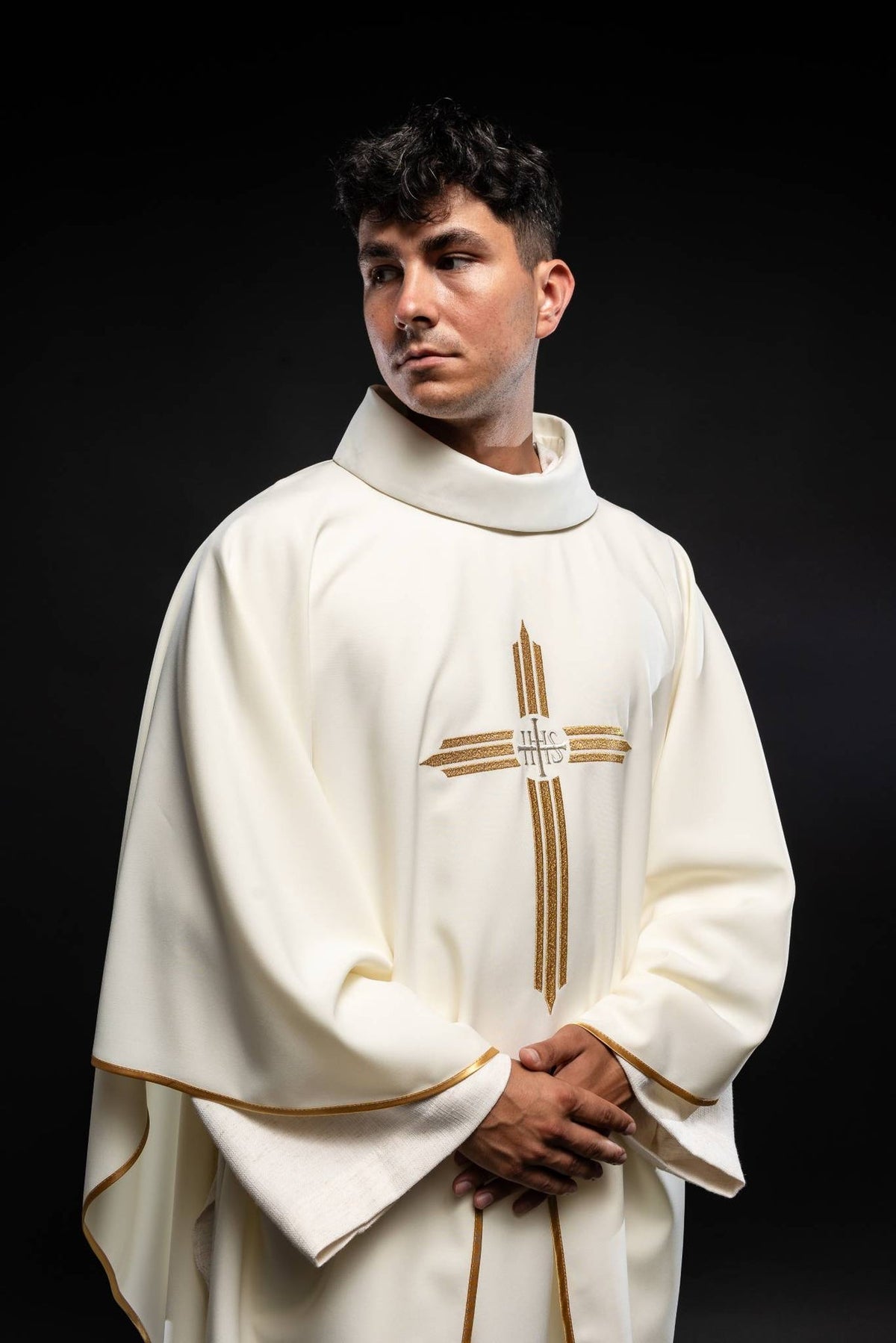 Ecru chasuble front view showing gold cross and IHS embroidery