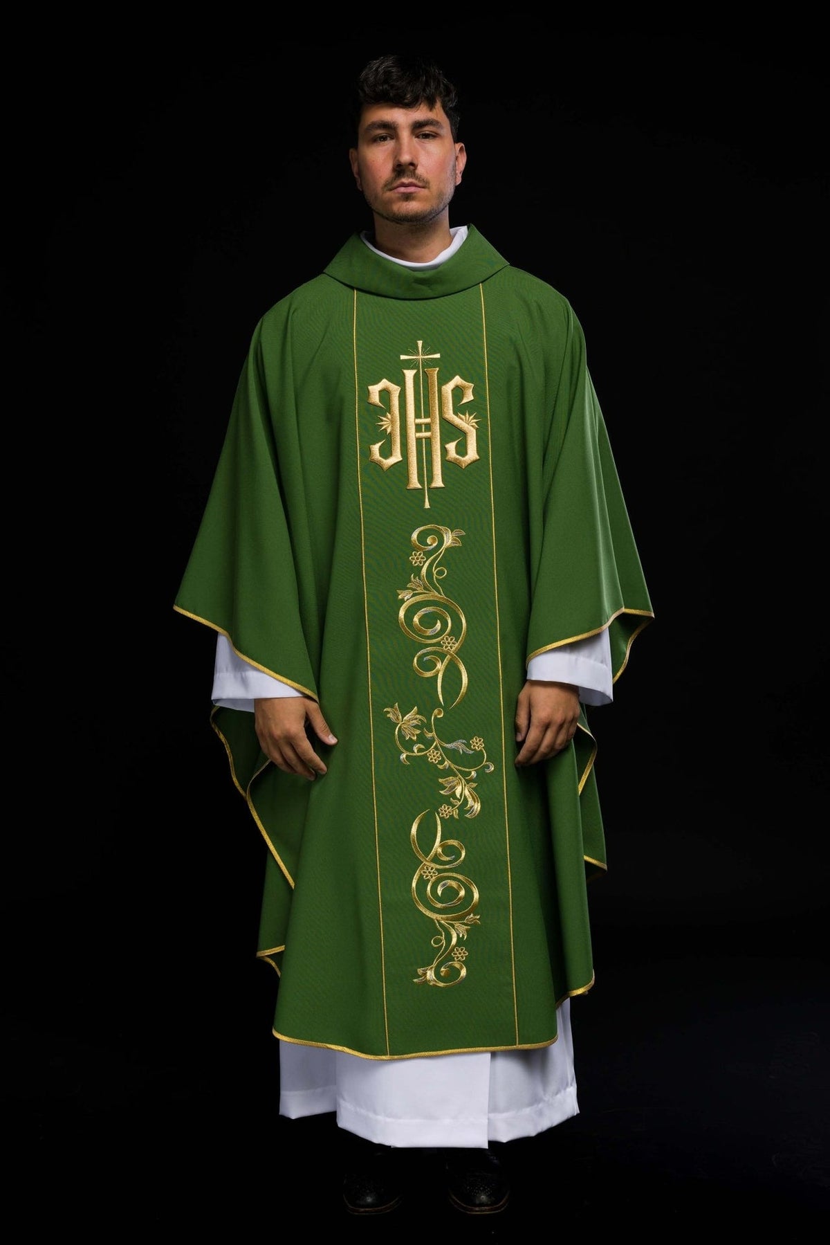 Green chasuble front view with gold IHS embroidery and floral motif