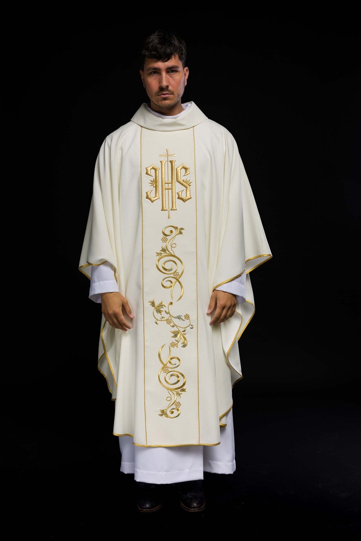 Ecru IHS chasuble, full front view with gold ornamental embroidery