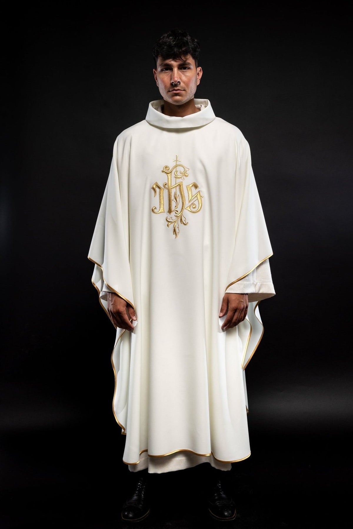 Cream chasuble front view with gold IHS embroidery and gold trim