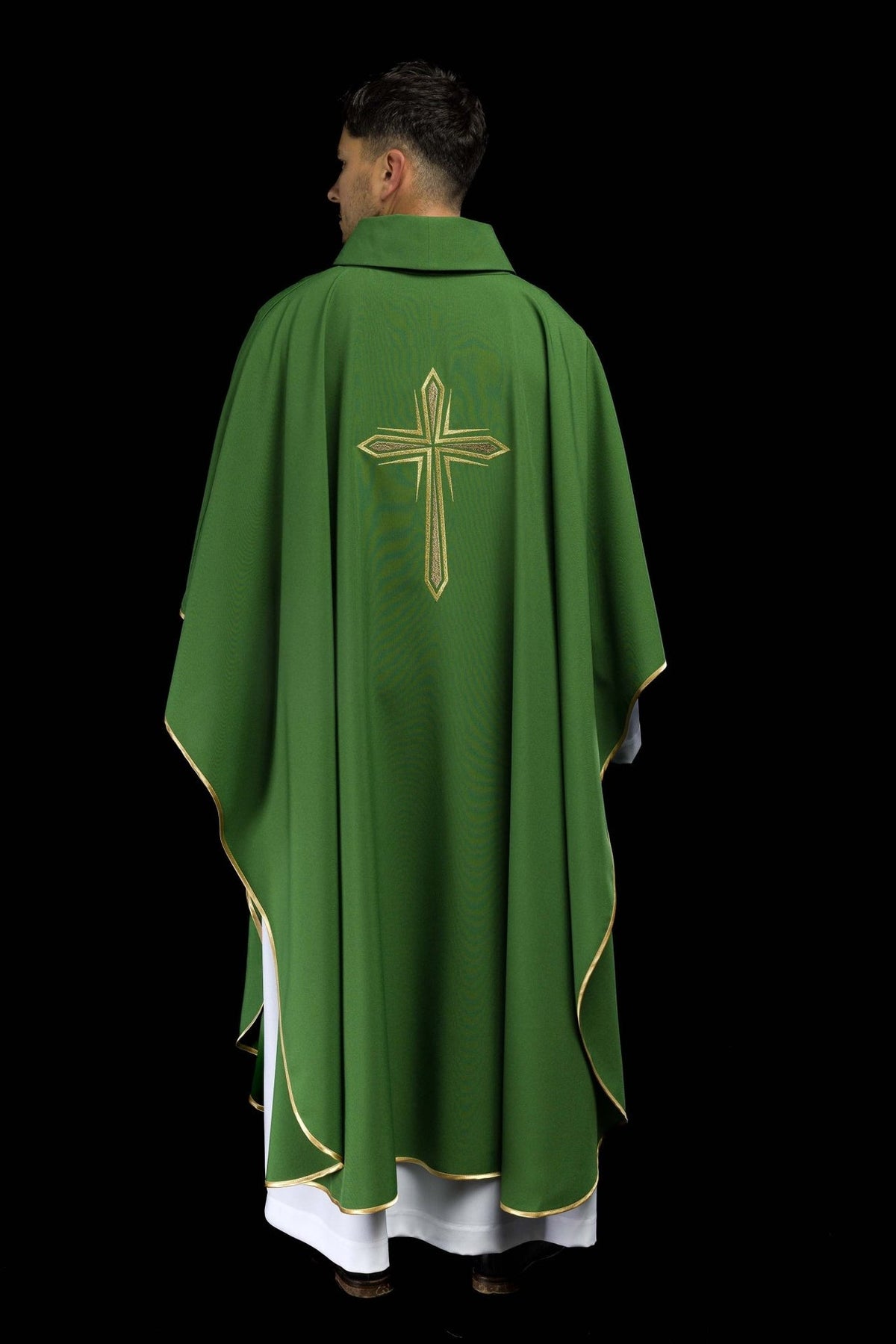 Green chasuble back view with gold trim and embroidered cross