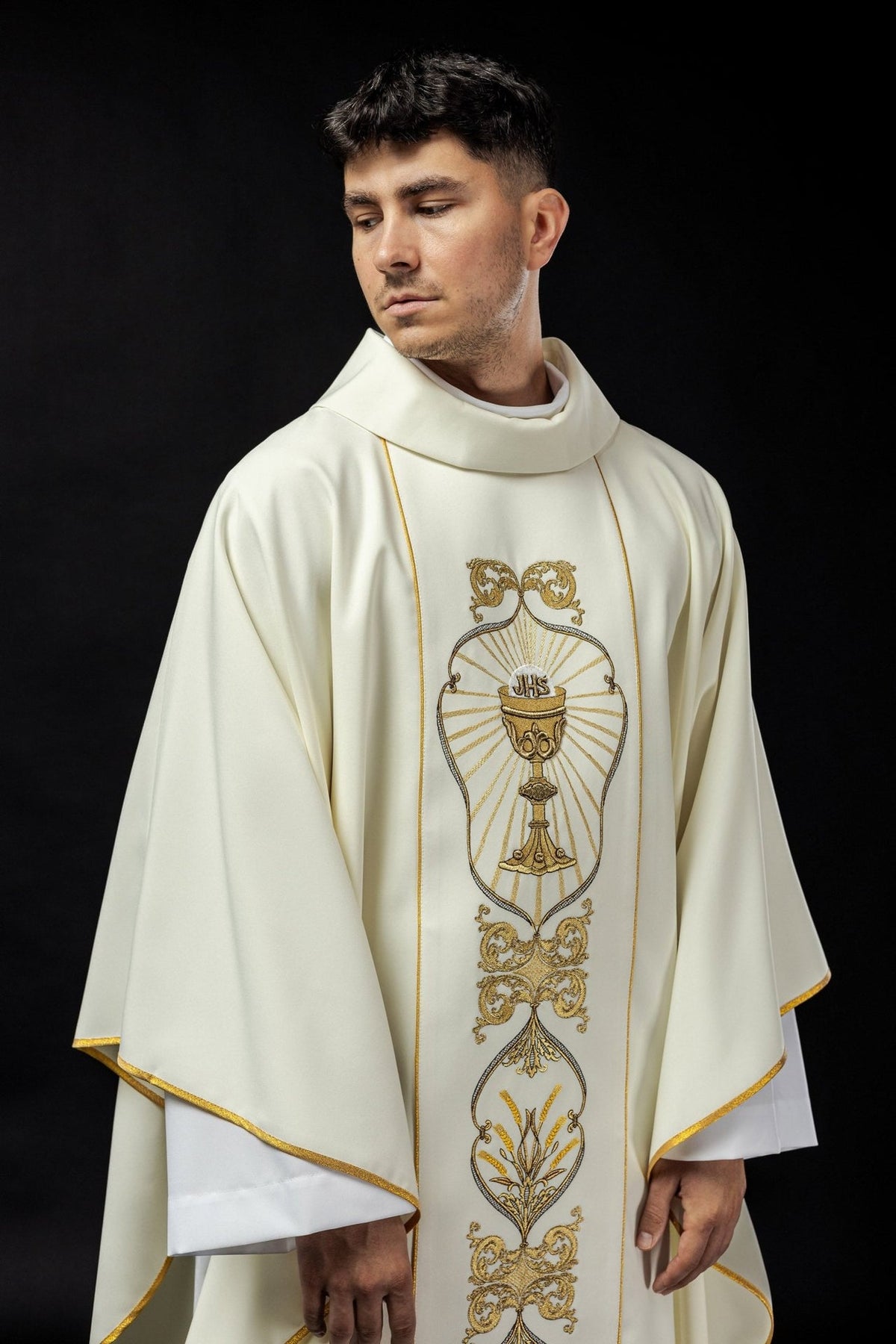 Ecru chasuble front close-up with gold IHS and chalice embroidery