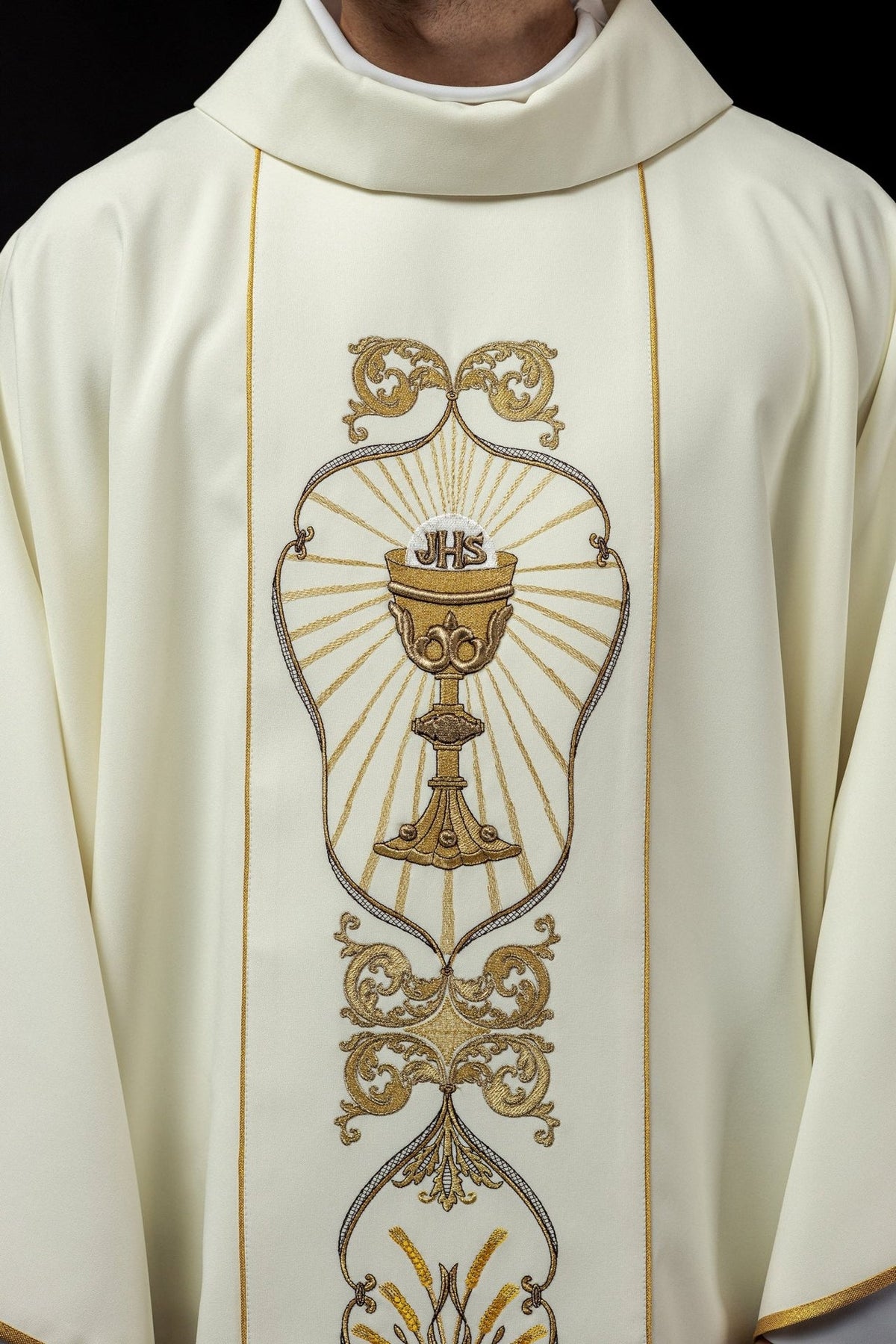 Ecru chasuble front detail with IHS, chalice and gold embroidery
