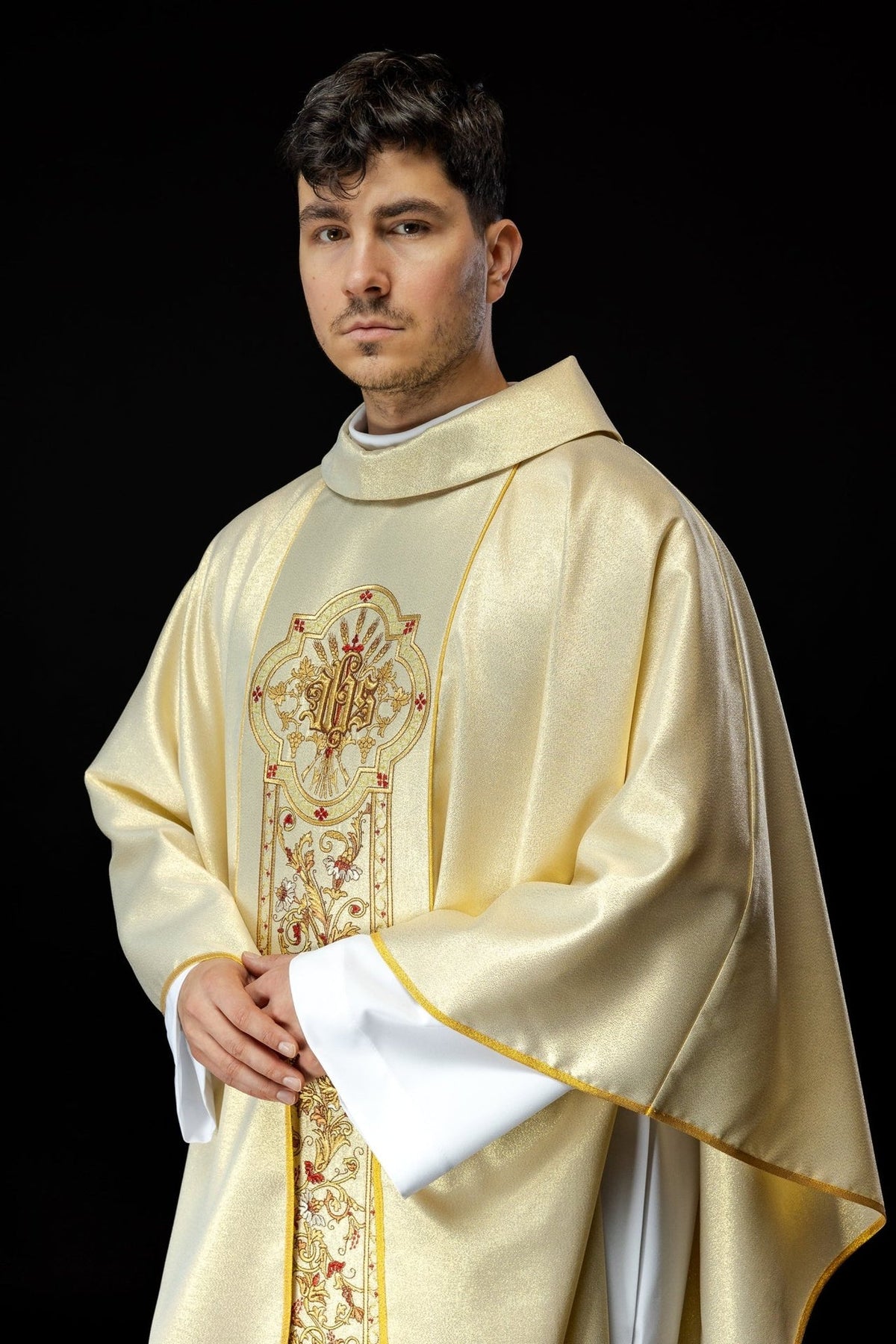 Gold chasuble side view showing the stand-up collar, wide sleeves and gold trim