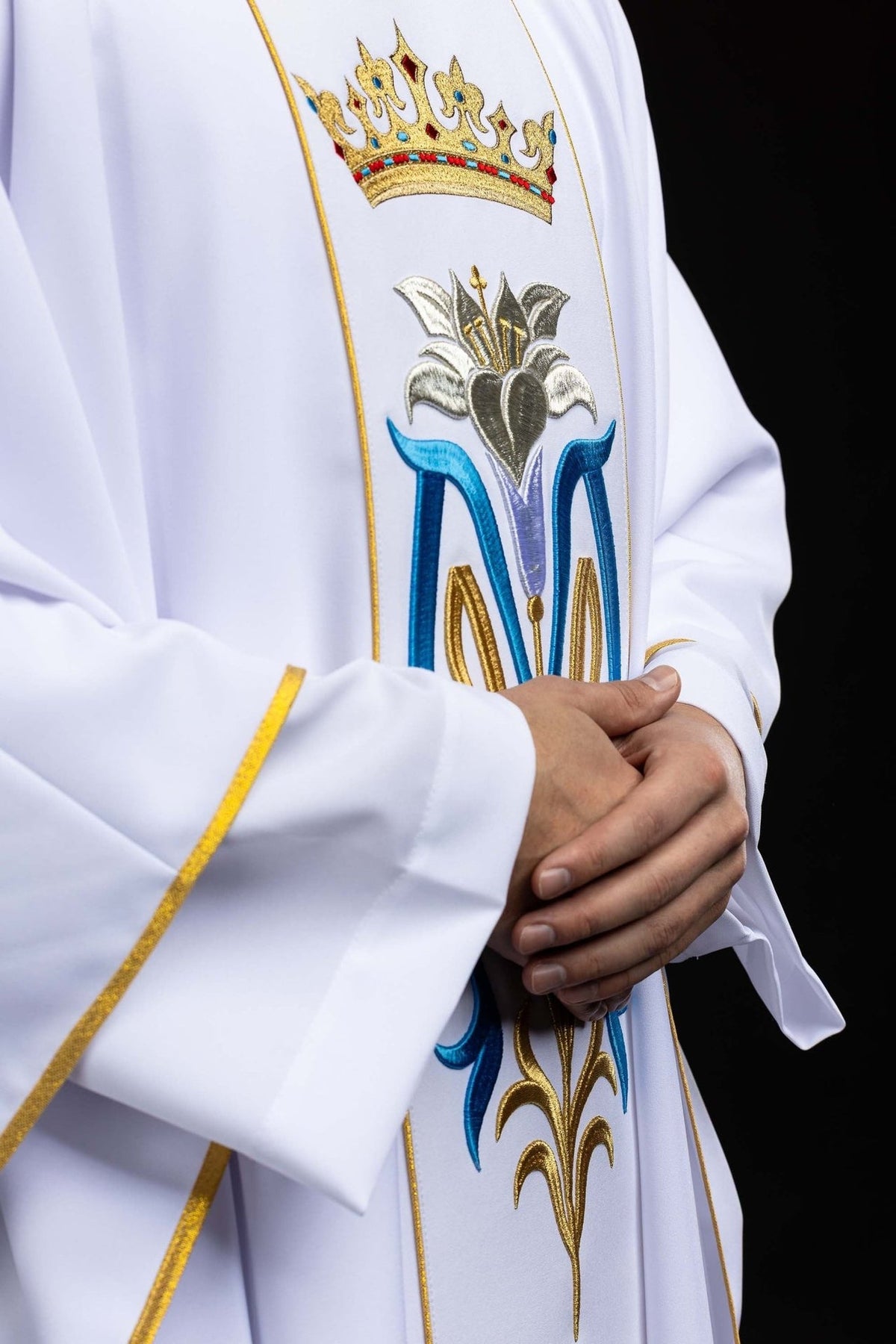 Marian chasuble side view showing crown, Marian embroidery and gold trim