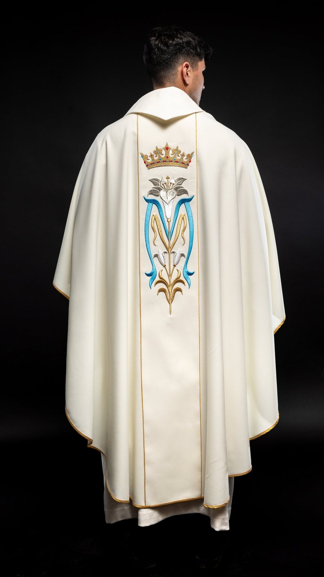 Ecru Marian chasuble back view with embroidered gold crown and Marian motif