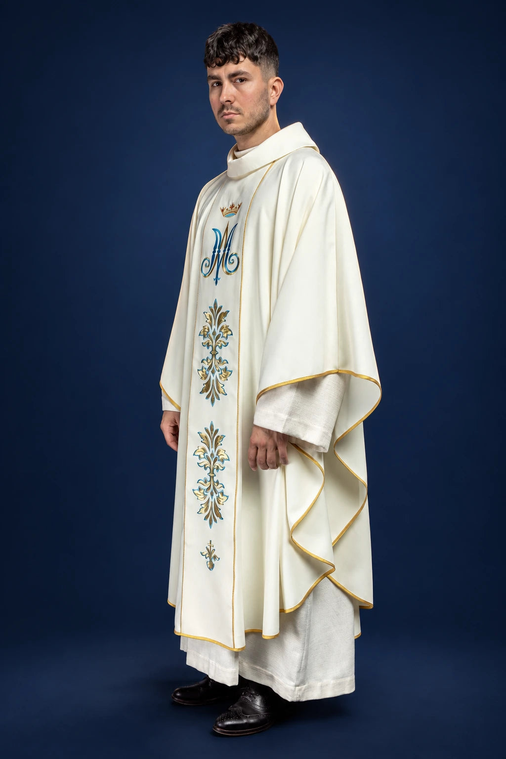 Marian chasuble, side view showing flowing shape, gold trim and front embroidery