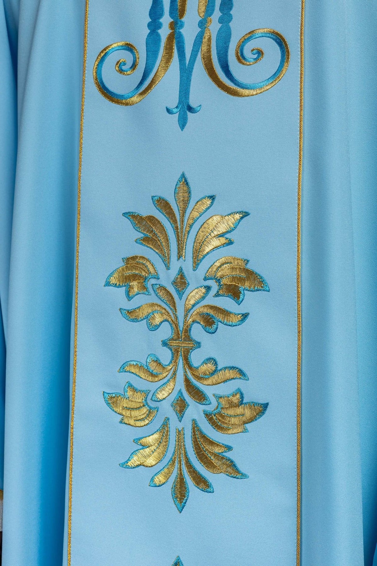Blue Marian chasuble, close-up of floral gold embroidery