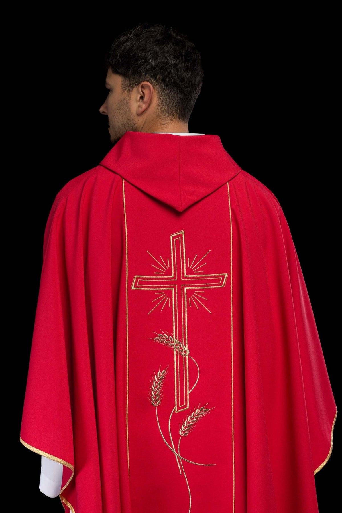 Red chasuble back close-up with stand-up collar and gold cross