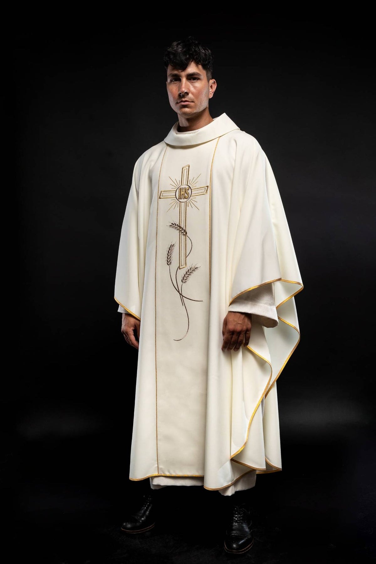 Ecru embroidered chasuble, angled front view with gold cross, IHS symbol and wheat motifs