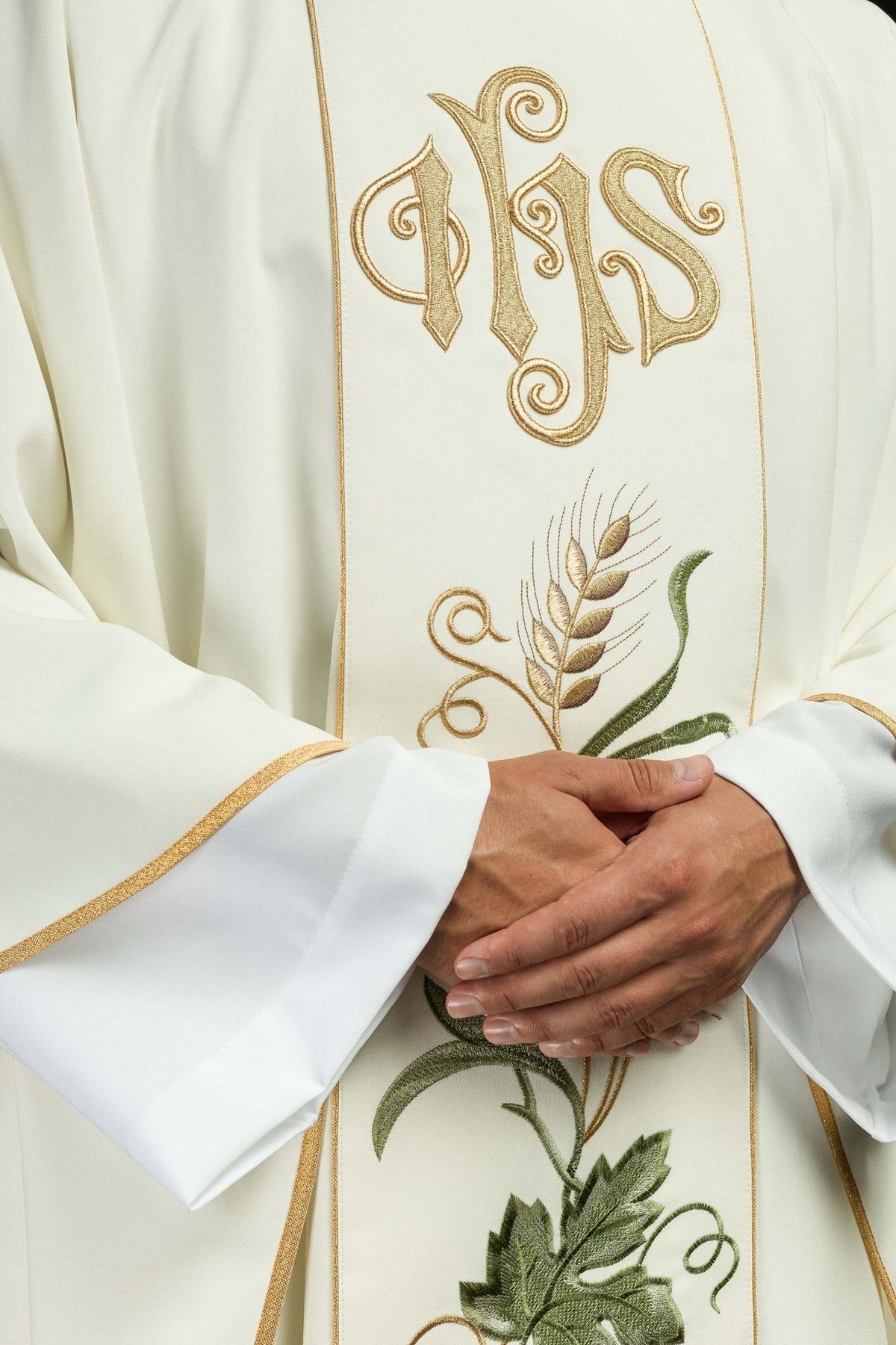 Ecru chasuble close-up of gold trim and embroidered wheat and grapes