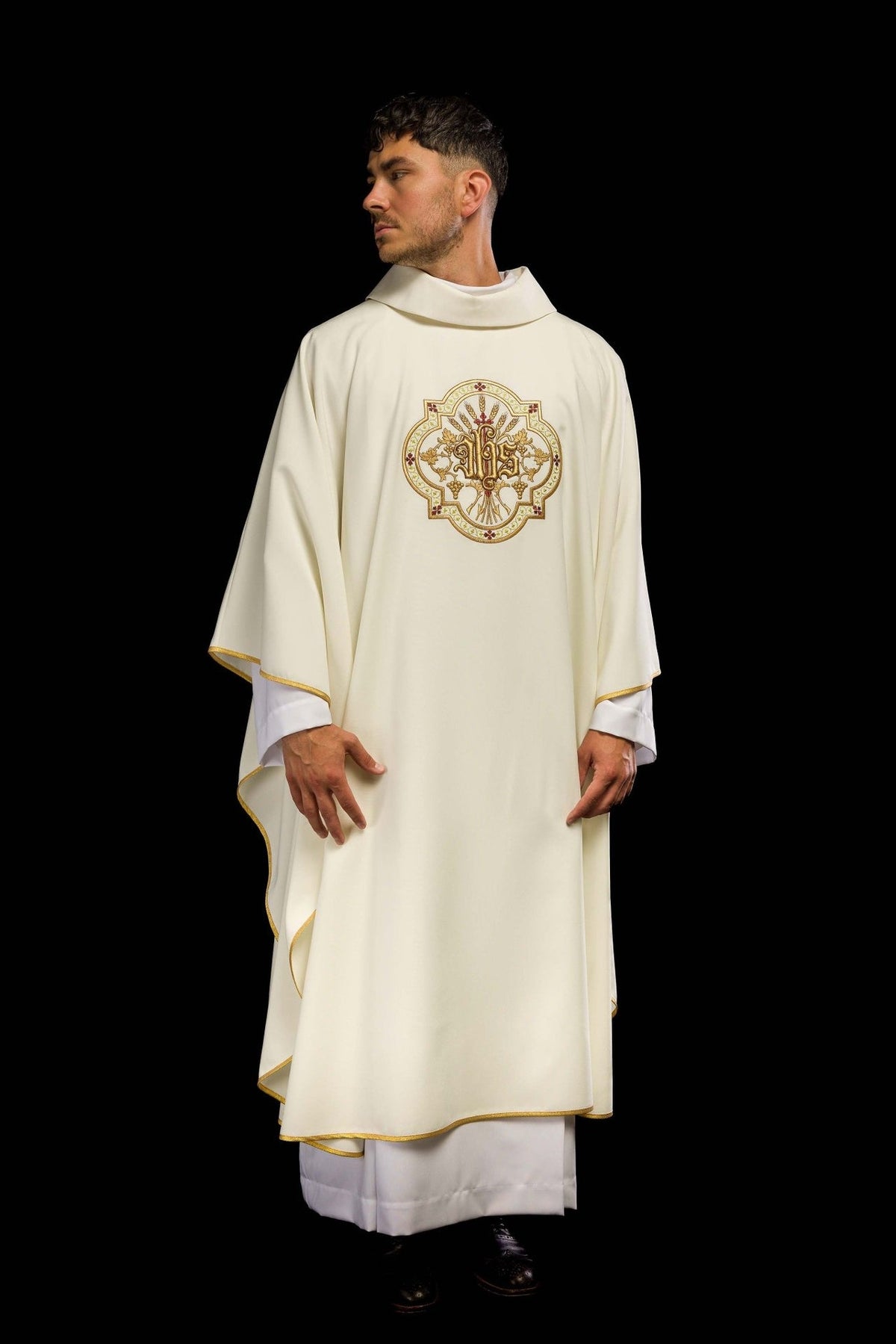 Cream chasuble, front view with IHS embroidery and gold trim