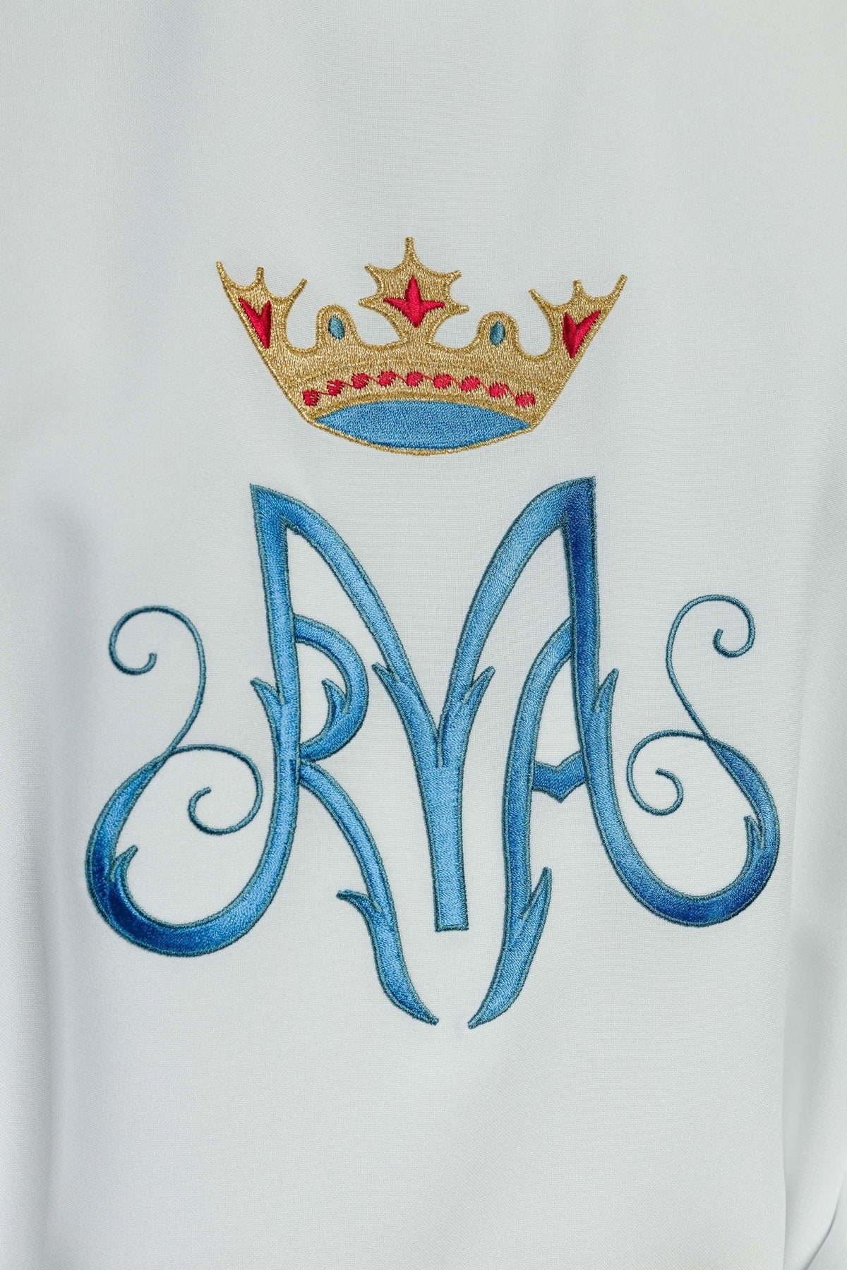 White Marian chasuble embroidered Marian monogram and crown close-up