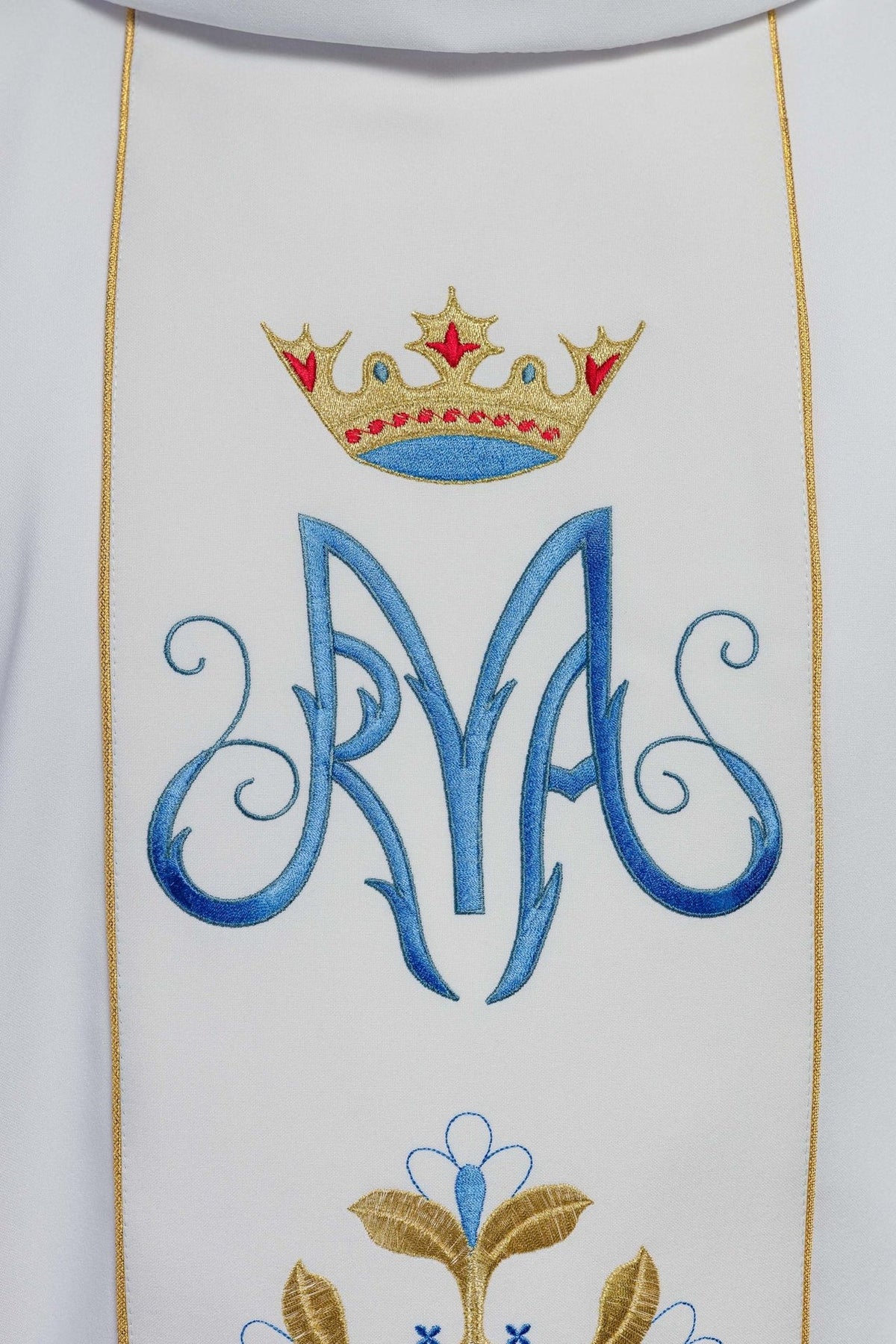 Marian chasuble orphrey close-up with embroidered blue Marian monogram and gold crown