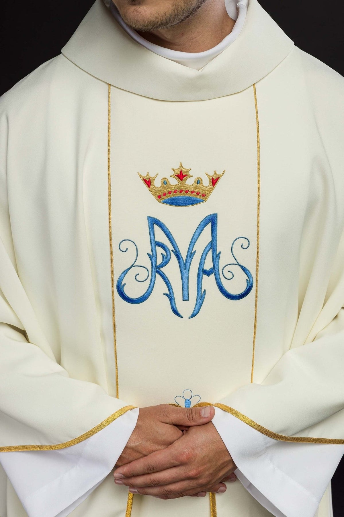 Marian chasuble front close-up showing embroidered blue Marian monogram and crowned orphrey