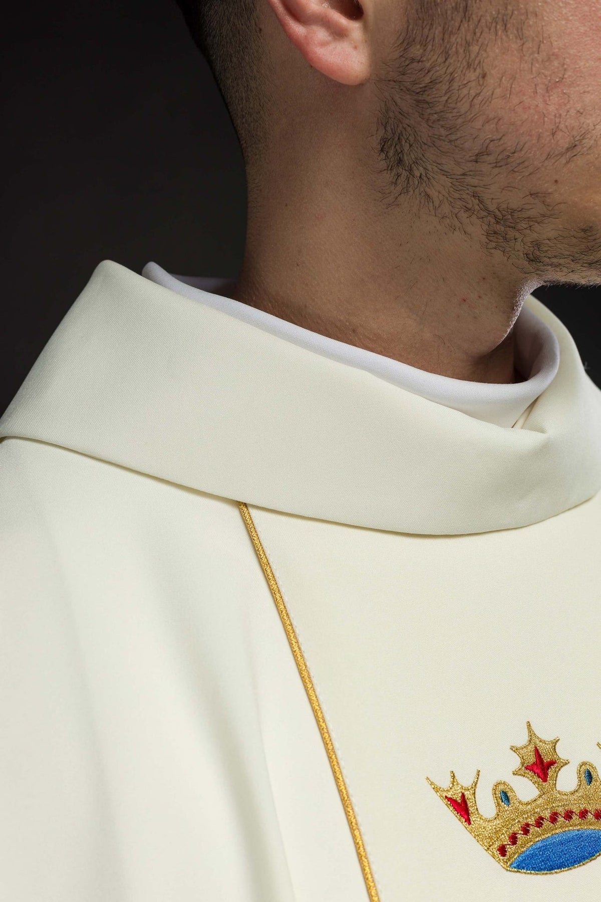 Marian chasuble close-up showing ecru stand-up collar and gold orphrey trim