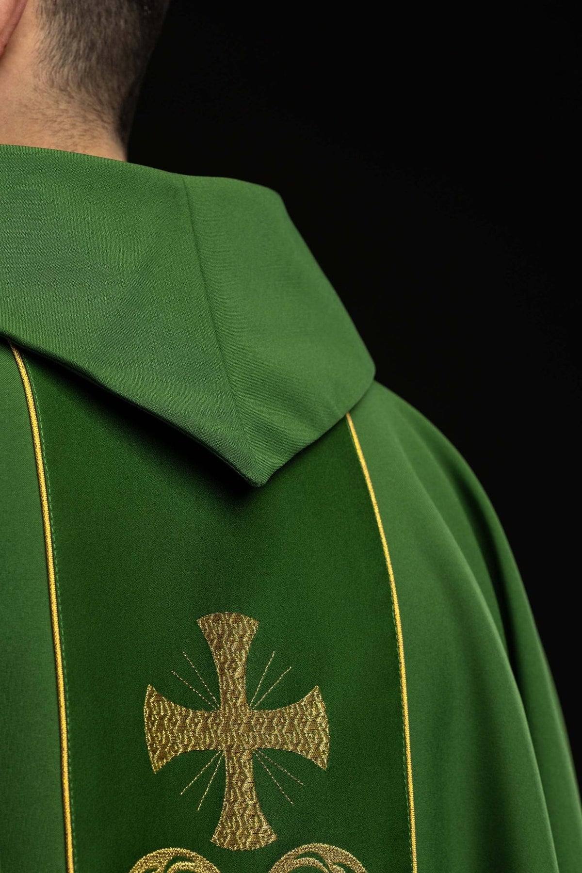 Green chasuble, close-up front view of gold cross embroidery and stand-up collar